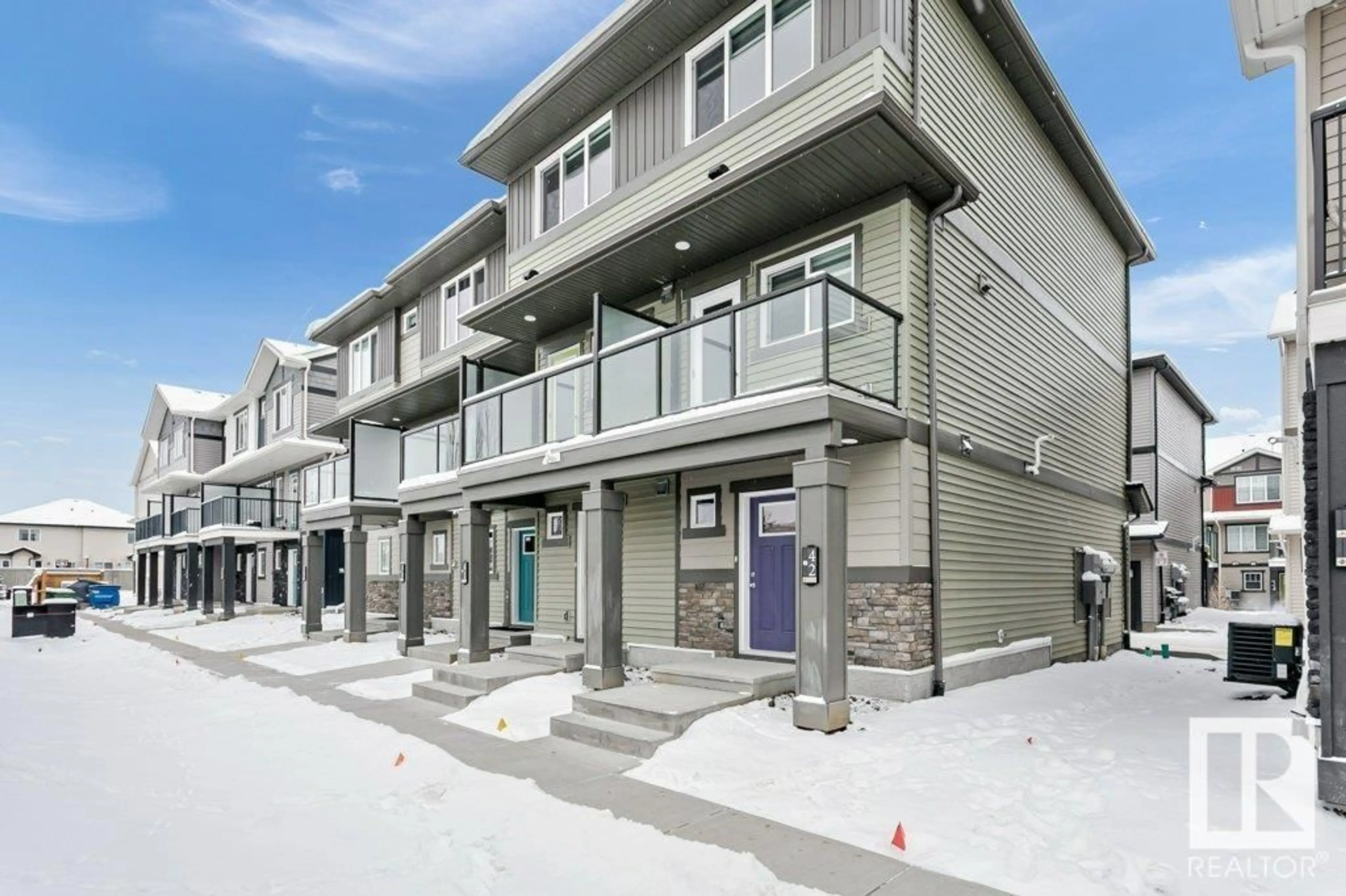 A pic from exterior of the house or condo, the front or back of building for #41 1530 TAMARACK BV NW NW, Edmonton Alberta T6T2E6