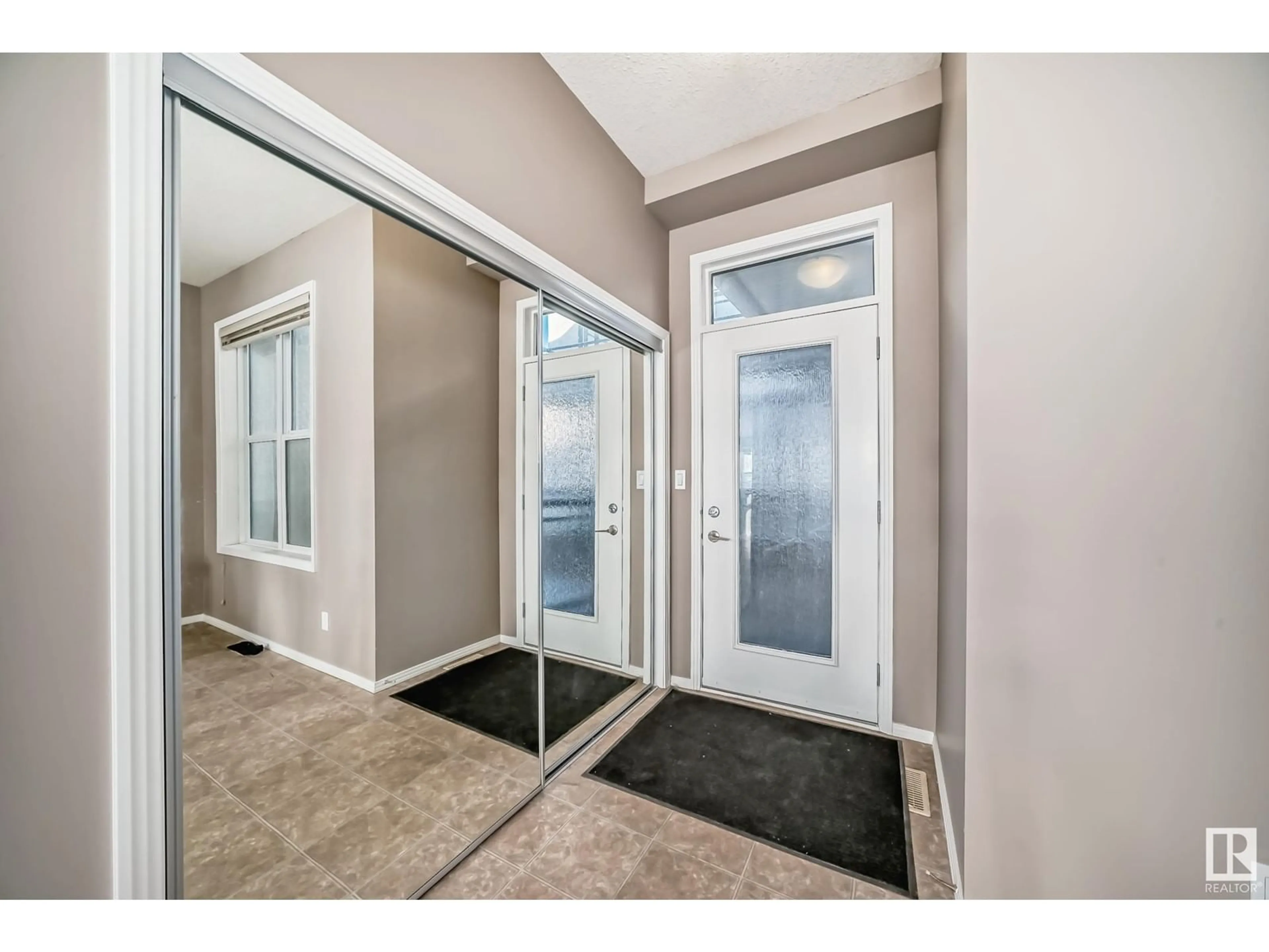 Indoor entryway, wood floors for #345 4827 104A ST NW, Edmonton Alberta T6H0R5