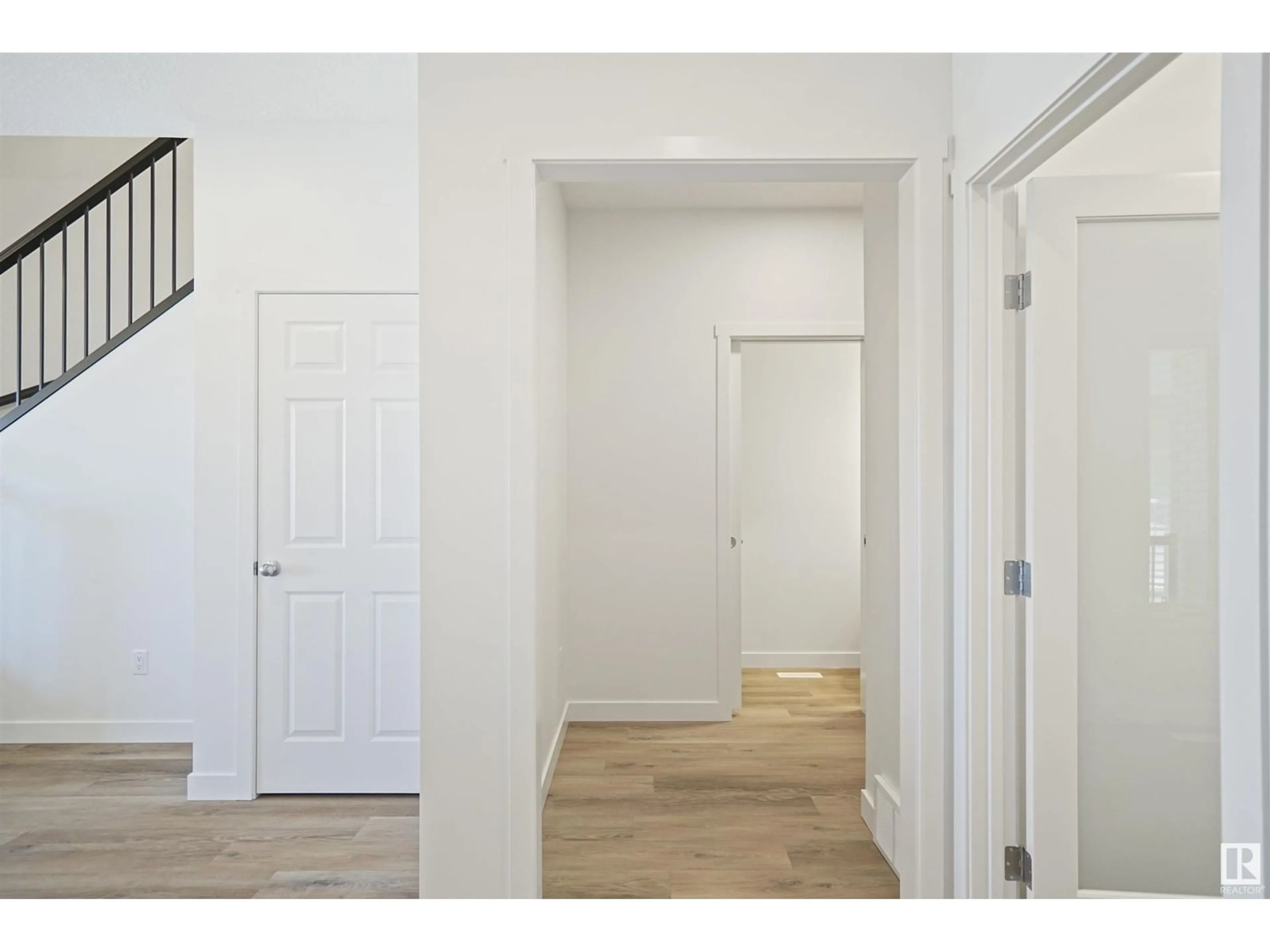 Indoor entryway, wood floors for 19231 24 AV NW, Edmonton Alberta T6M1P7