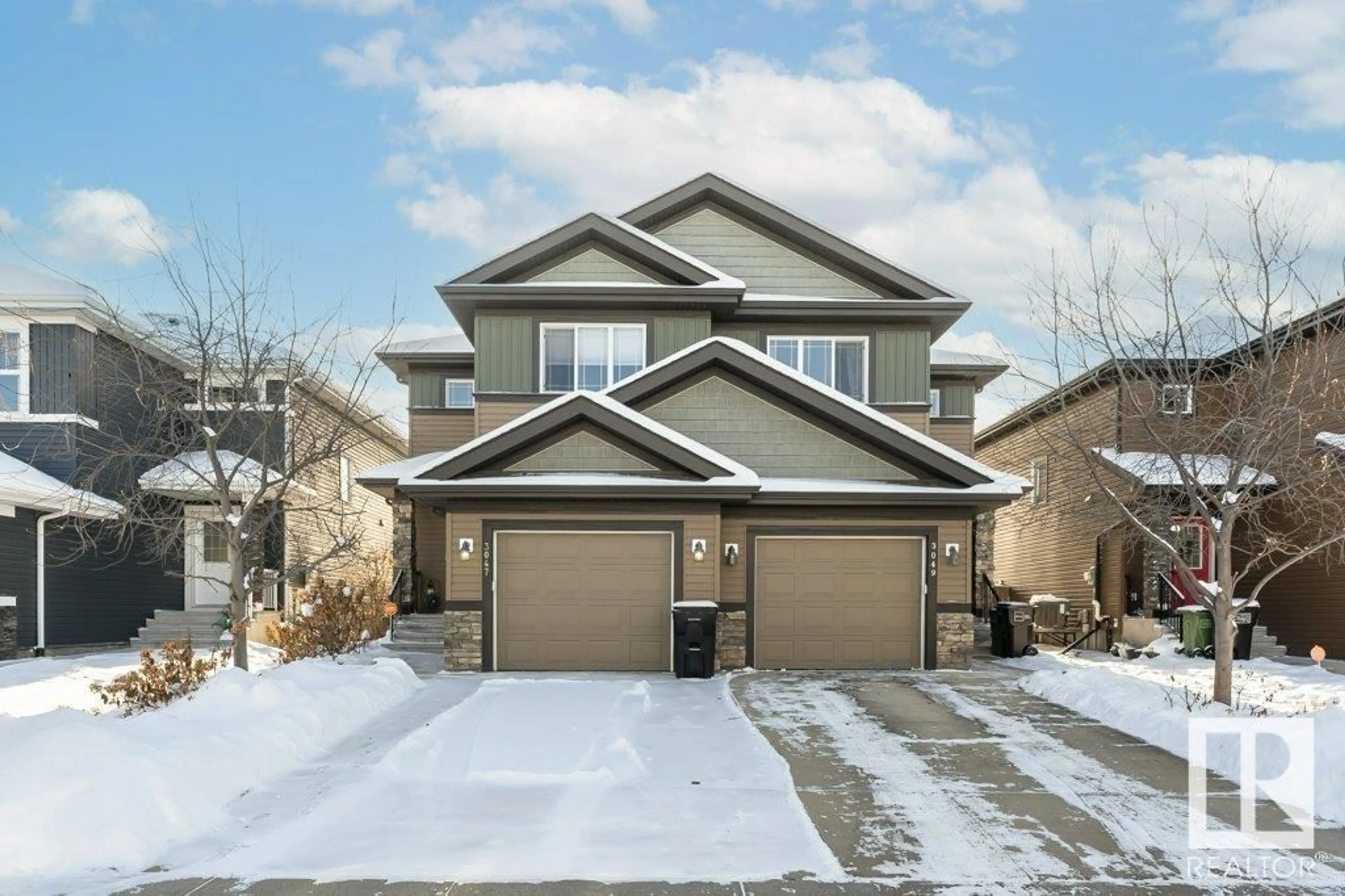 Frontside or backside of a home, the street view for 3047 HARVEY CR NW, Edmonton Alberta T6M0N4