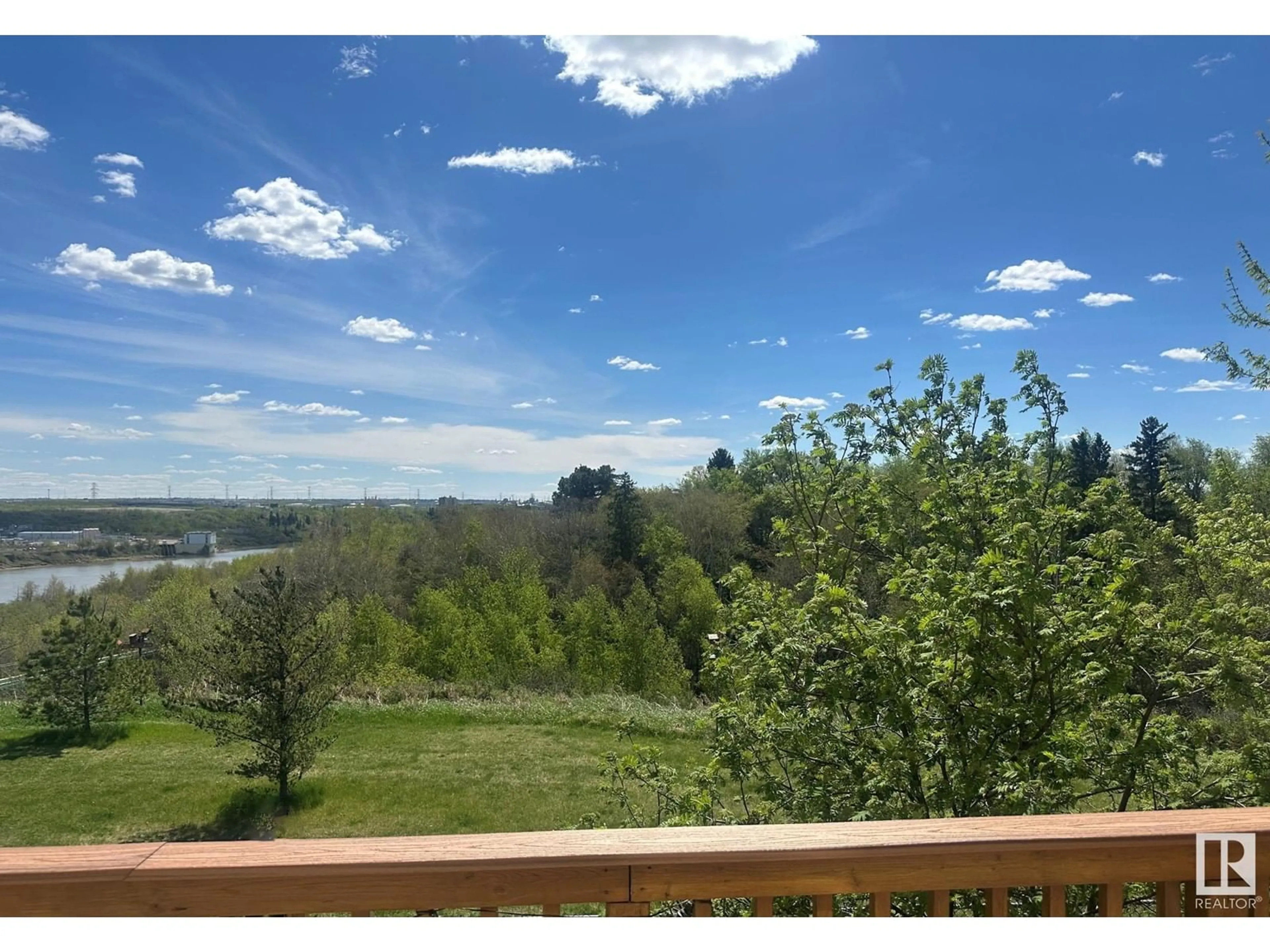 A pic from outside/outdoor area/front of a property/back of a property/a pic from drone, water/lake/river/ocean view for #33 2419 133 AV NW, Edmonton Alberta T5A5A5