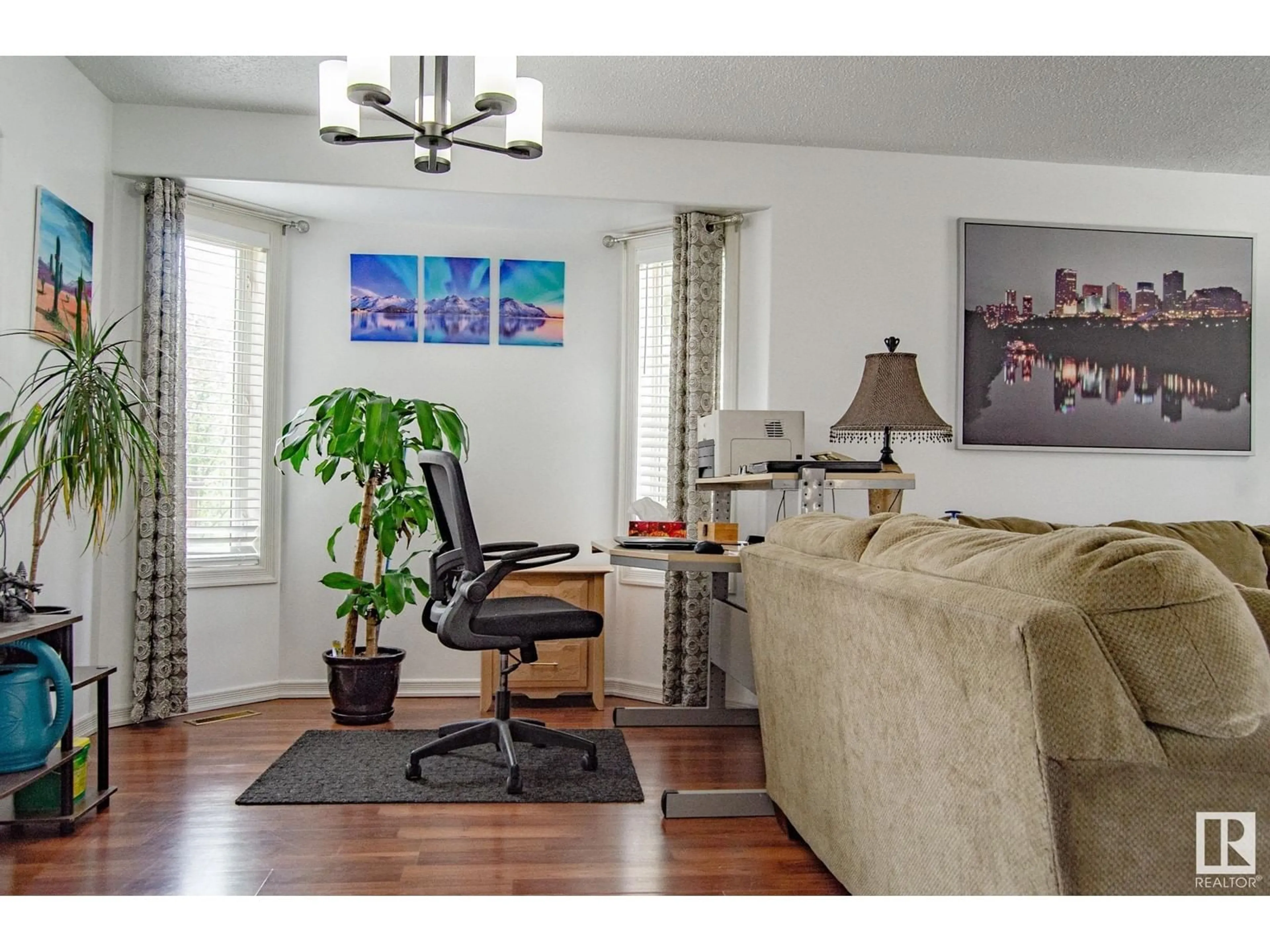 A pic of a room, wood floors for #33 2419 133 AV NW, Edmonton Alberta T5A5A5