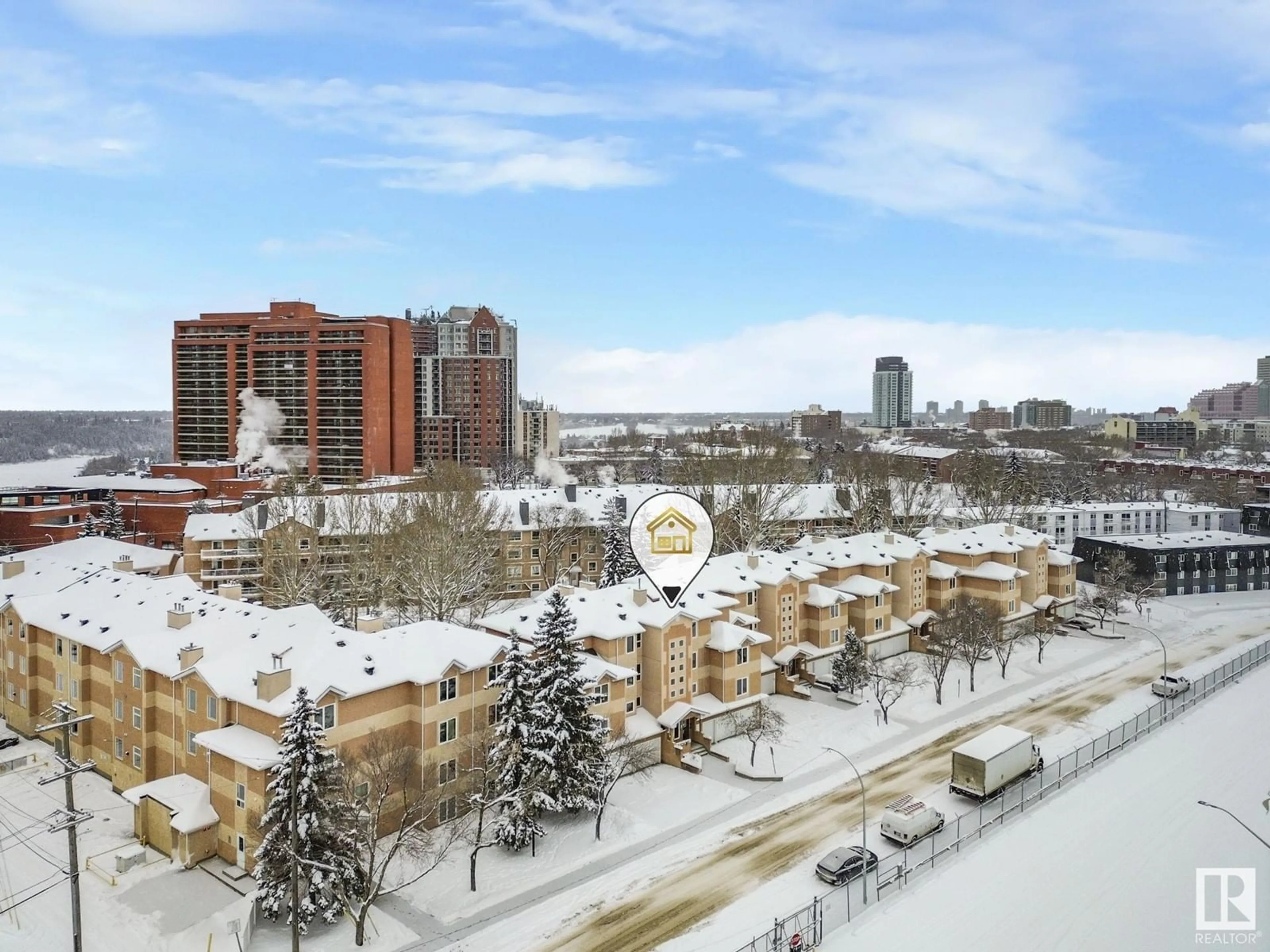 A pic from exterior of the house or condo, the view of city buildings for #108 8903 106A AV NW, Edmonton Alberta T5H3Y7