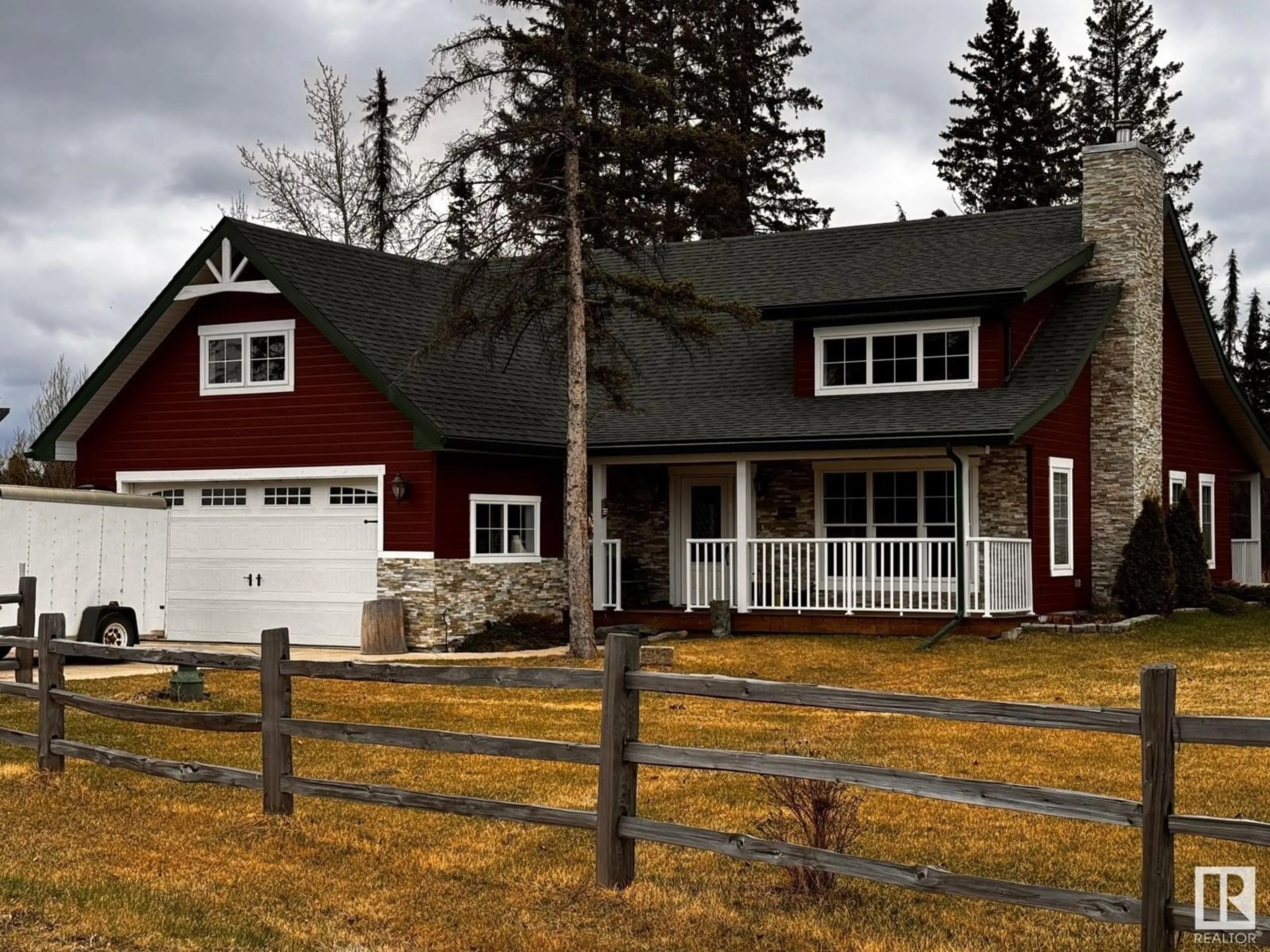 Home with vinyl exterior material, street for 630049 RANGE ROAD 55, Rural Woodlands County Alberta T0G0J0