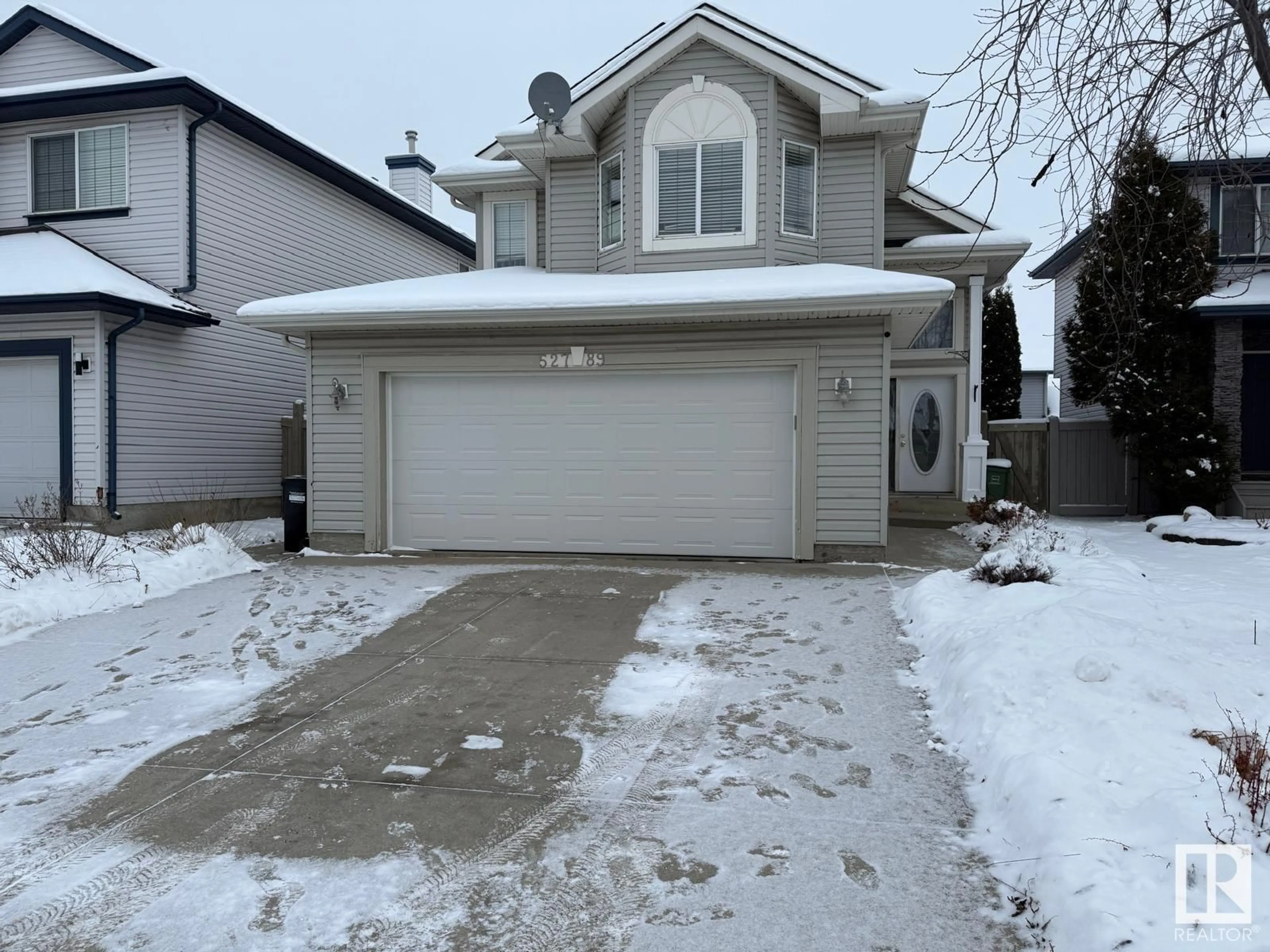 Frontside or backside of a home, the street view for 527 89 ST SW, Edmonton Alberta T6X1C2