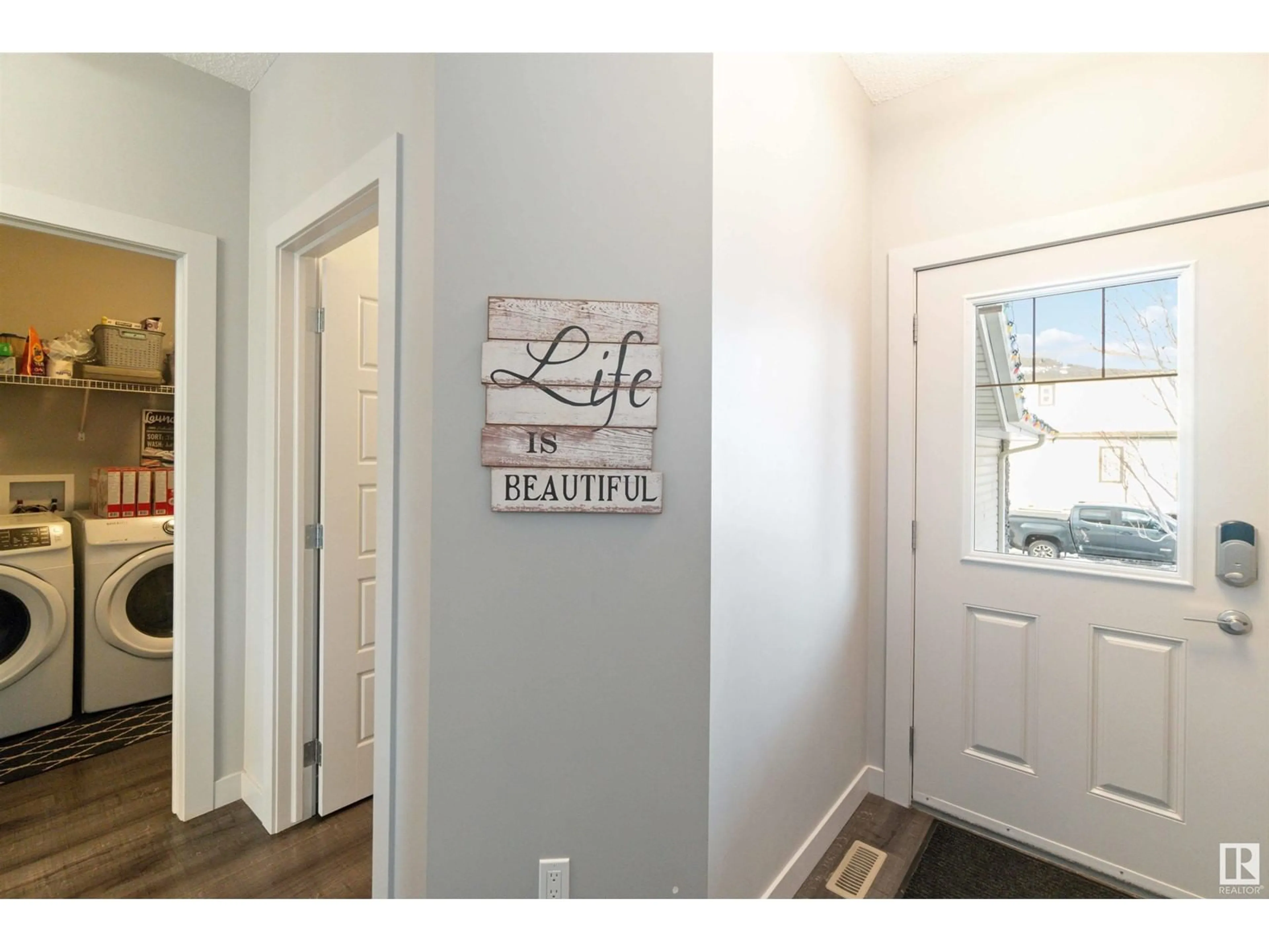 Indoor entryway, wood floors for 7173 CARDINAL WY SW, Edmonton Alberta T6W2Y5