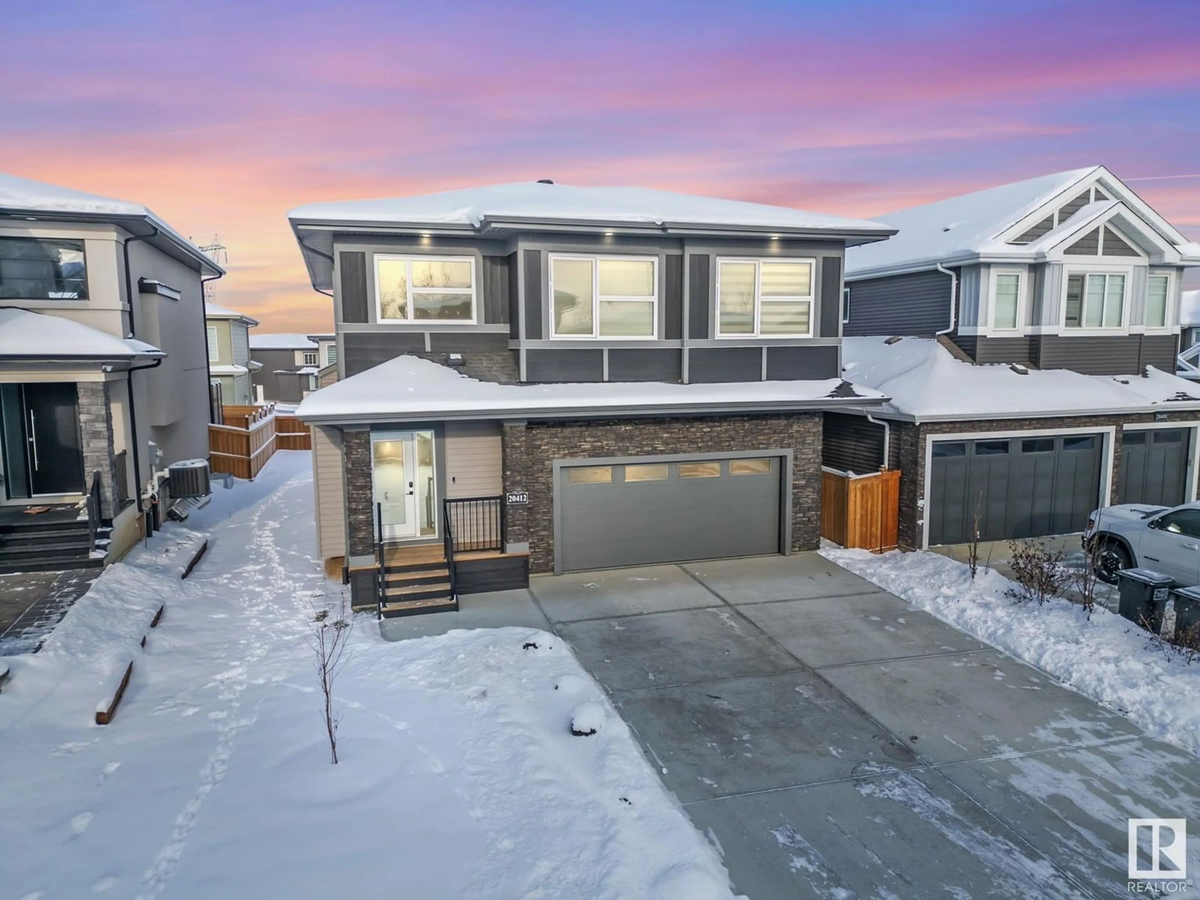 Frontside or backside of a home, the street view for 20412 128 AV NW, Edmonton Alberta T5S0N4