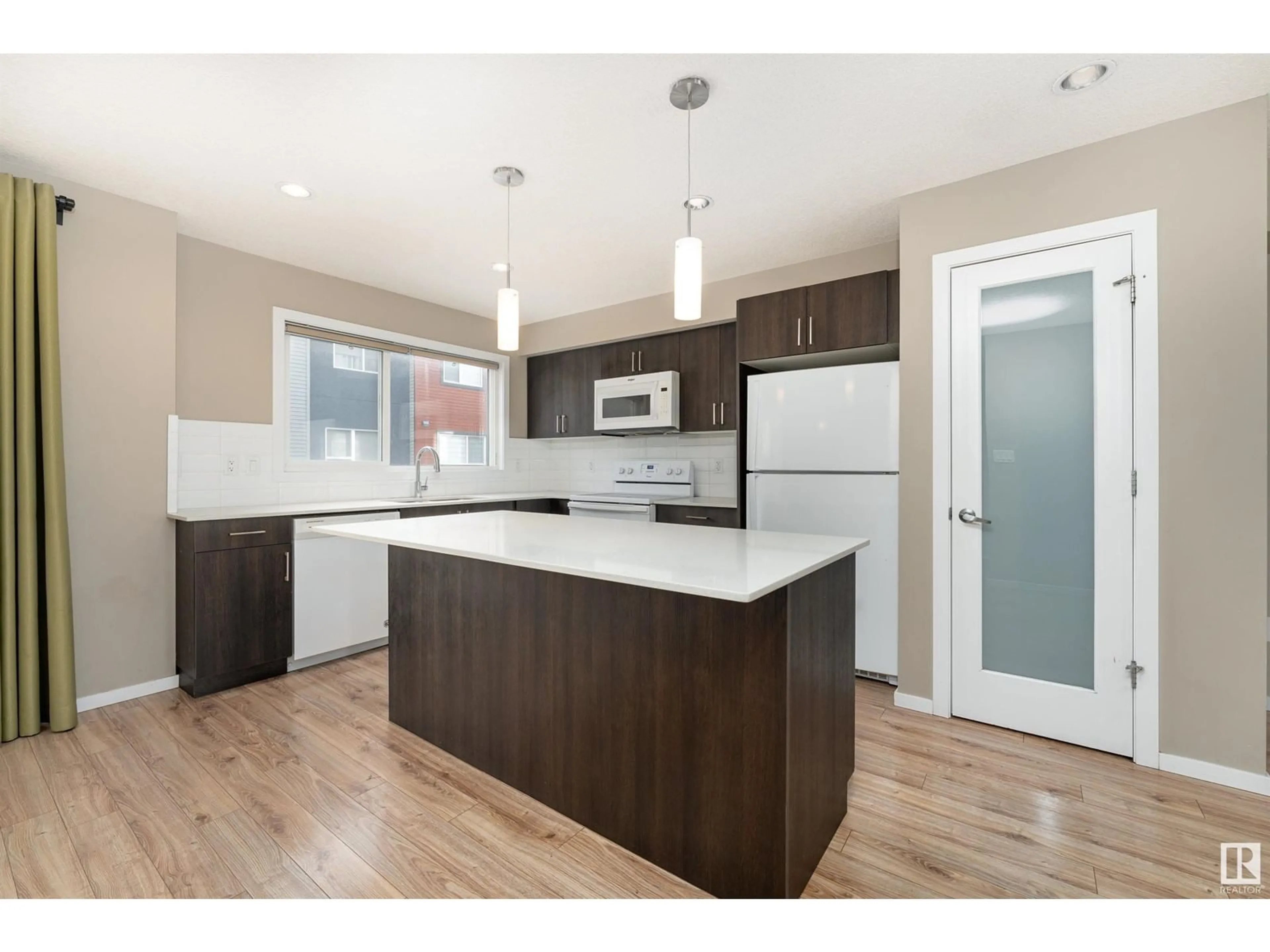 Open concept kitchen for 1081 ROSENTHAL BV NW, Edmonton Alberta T5T7G5