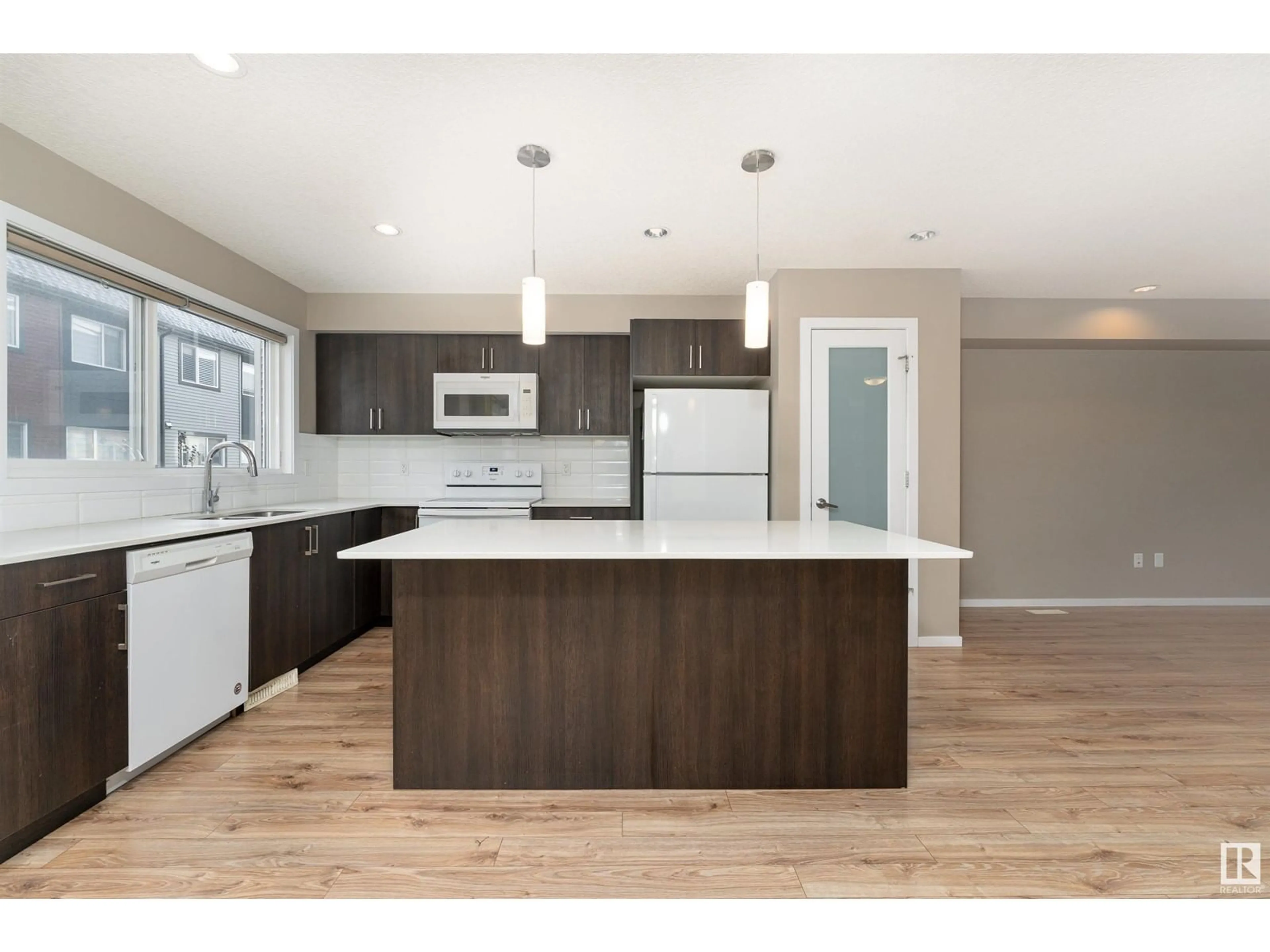 Open concept kitchen for 1081 ROSENTHAL BV NW, Edmonton Alberta T5T7G5