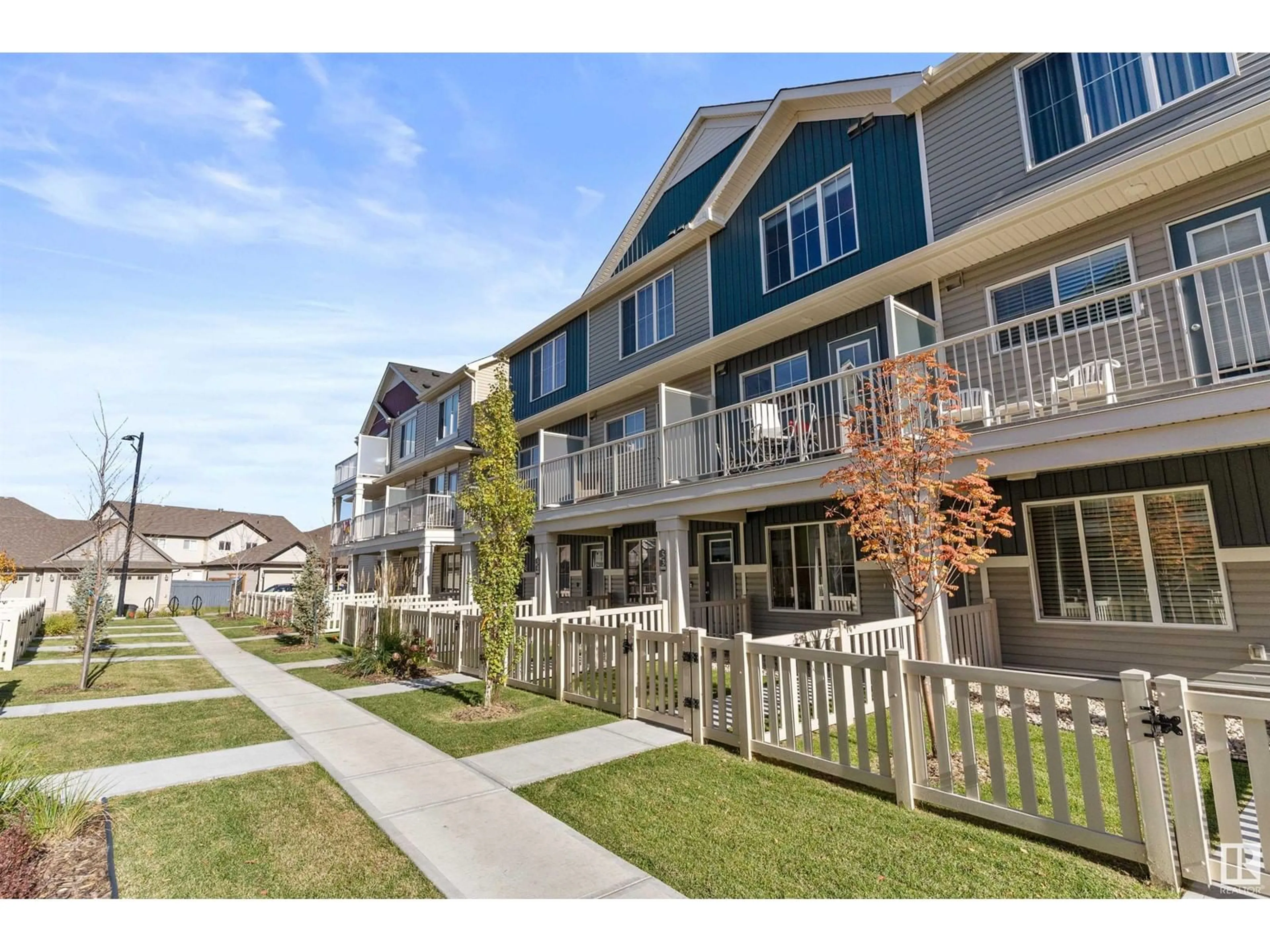 A pic from exterior of the house or condo, the fenced backyard for #32 1110 DANIELS LINK LI SW, Edmonton Alberta T6W4N6