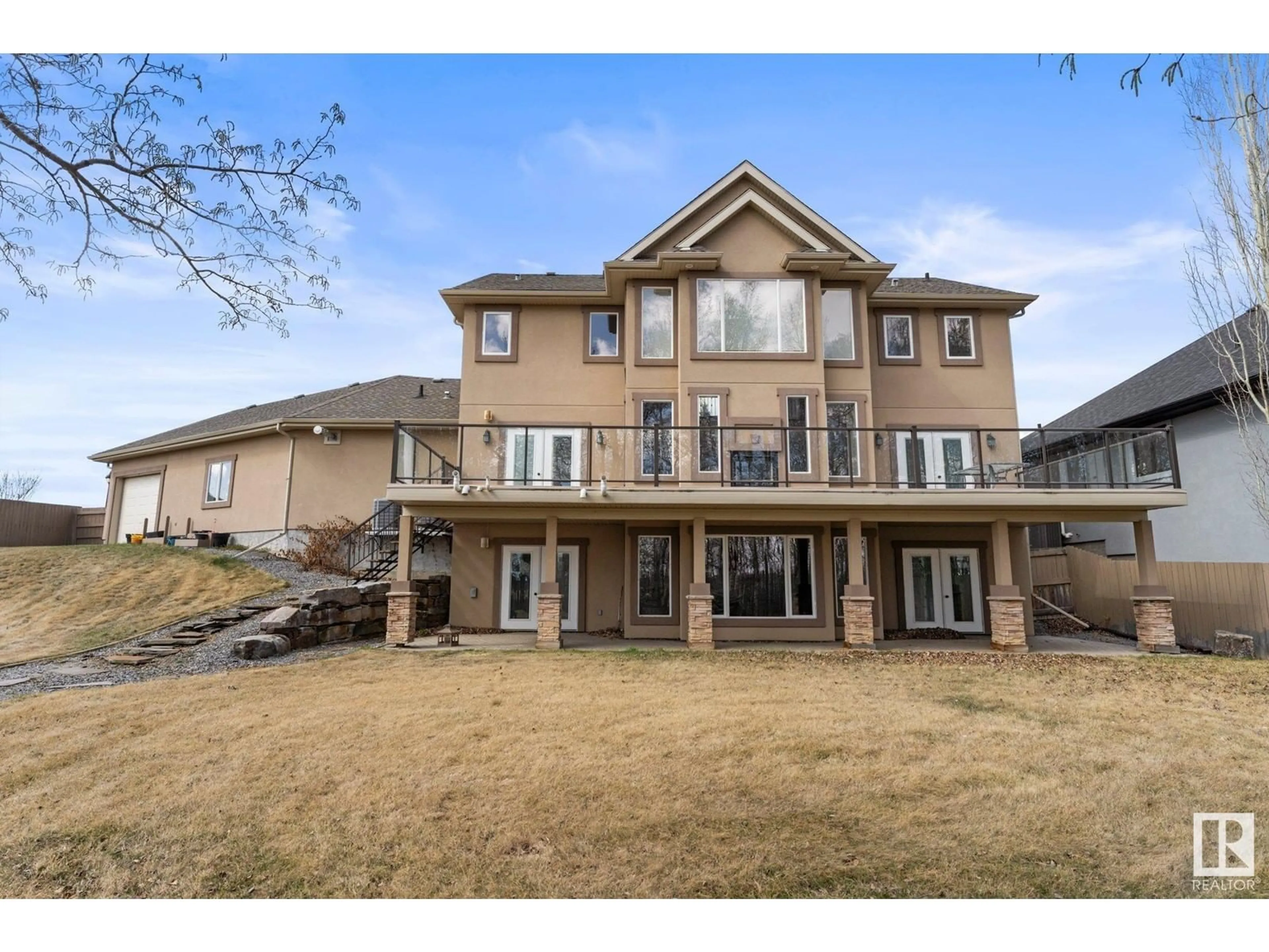 Frontside or backside of a home, the fenced backyard for 1086 GENESIS LAKE BV, Stony Plain Alberta T7Z2P8