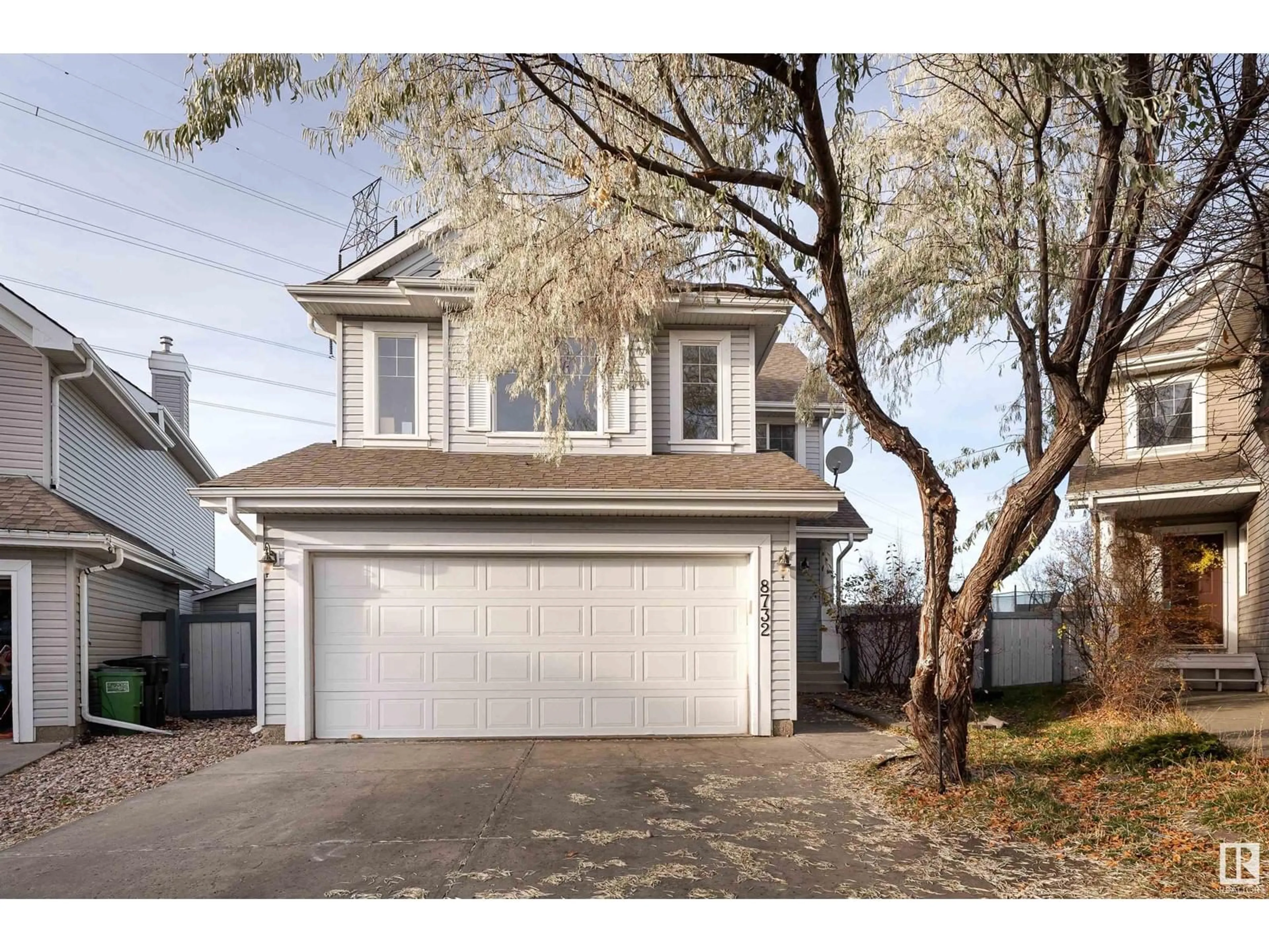 Frontside or backside of a home, the street view for 8732 10 AV SW, Edmonton Alberta T6X1J6