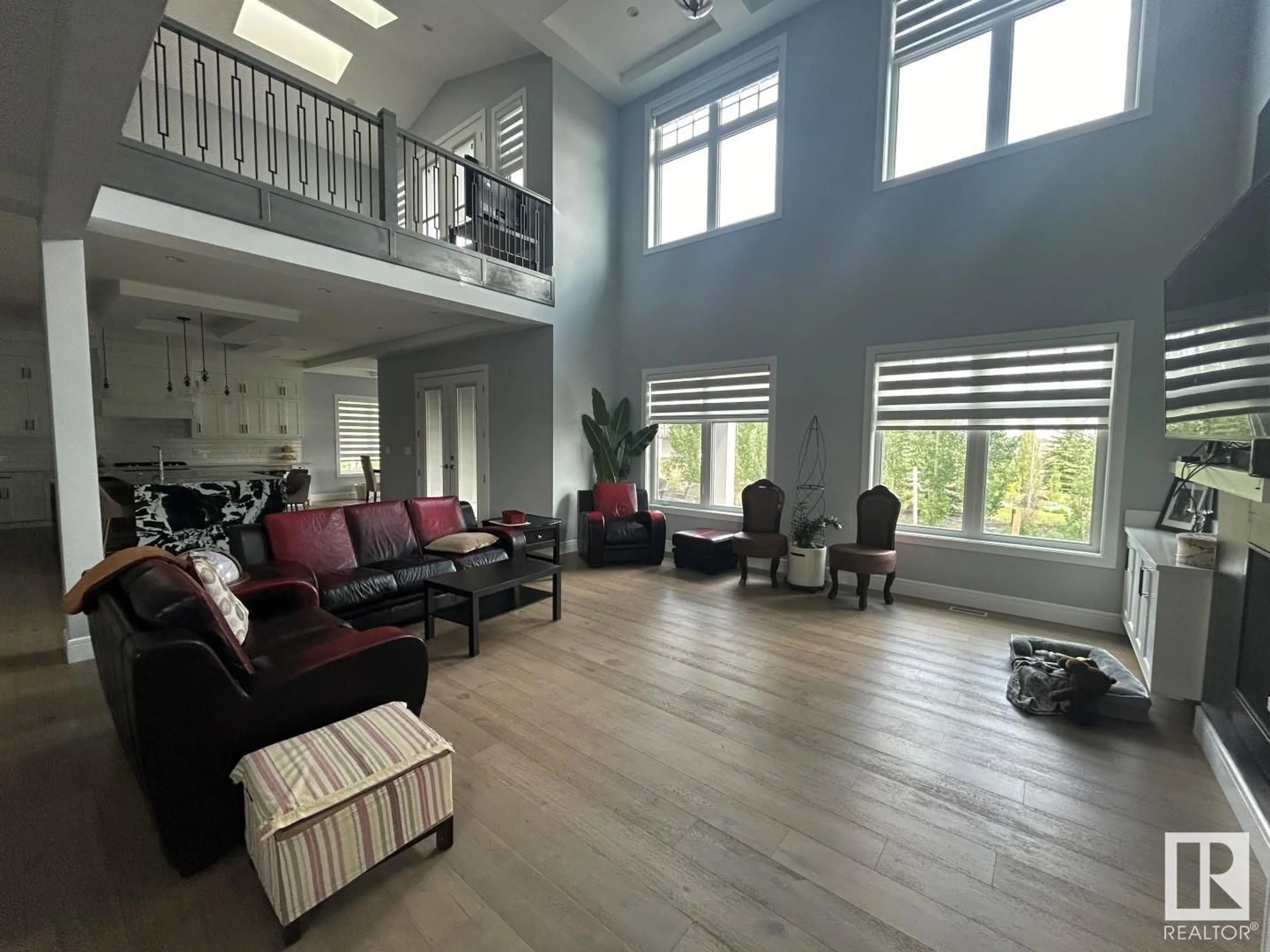 Living room, wood floors for 60 Riverstone CL, Rural Sturgeon County Alberta T8T0B9