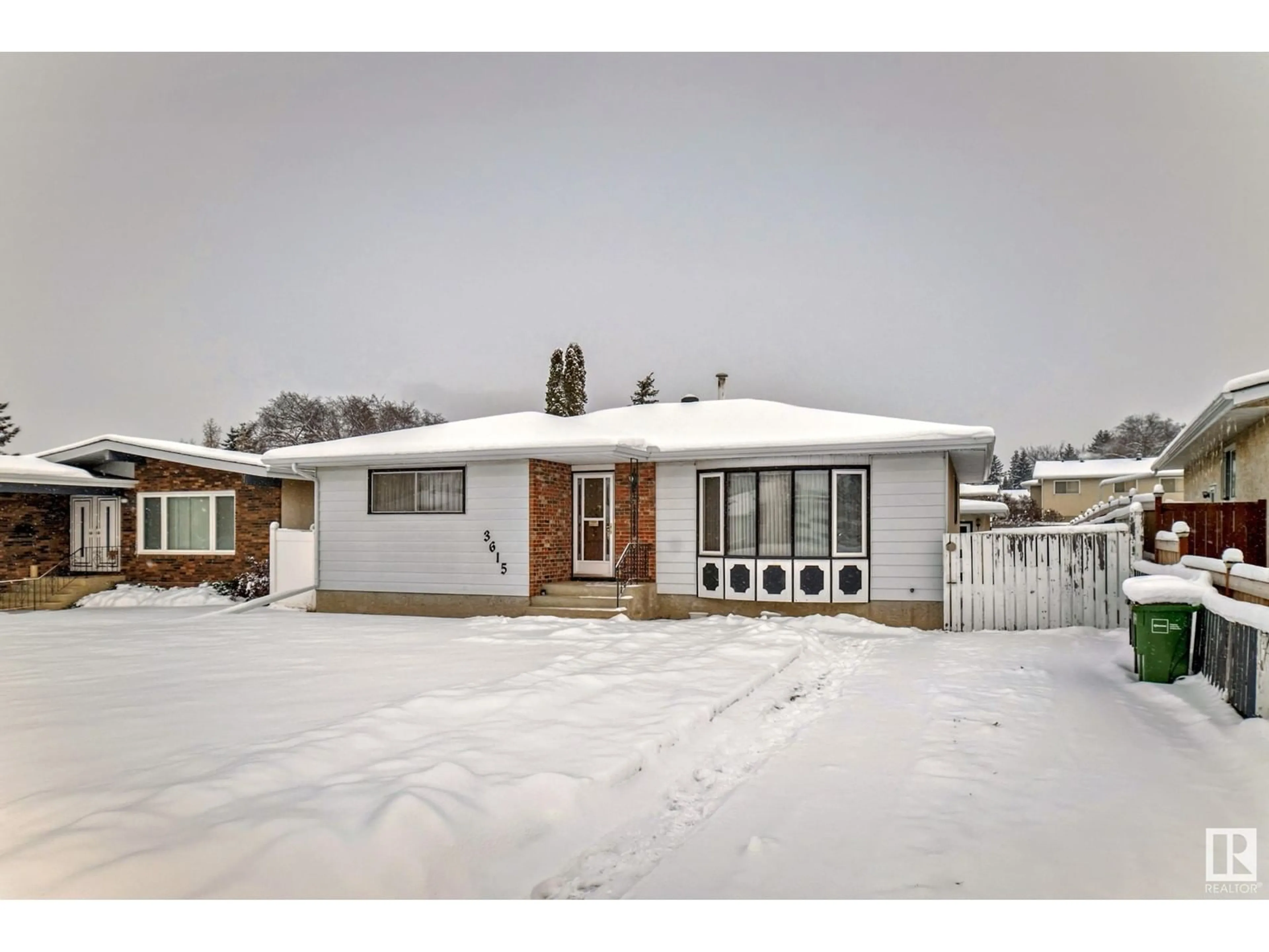 Frontside or backside of a home for 3615 75 ST NW, Edmonton Alberta T6K0L5