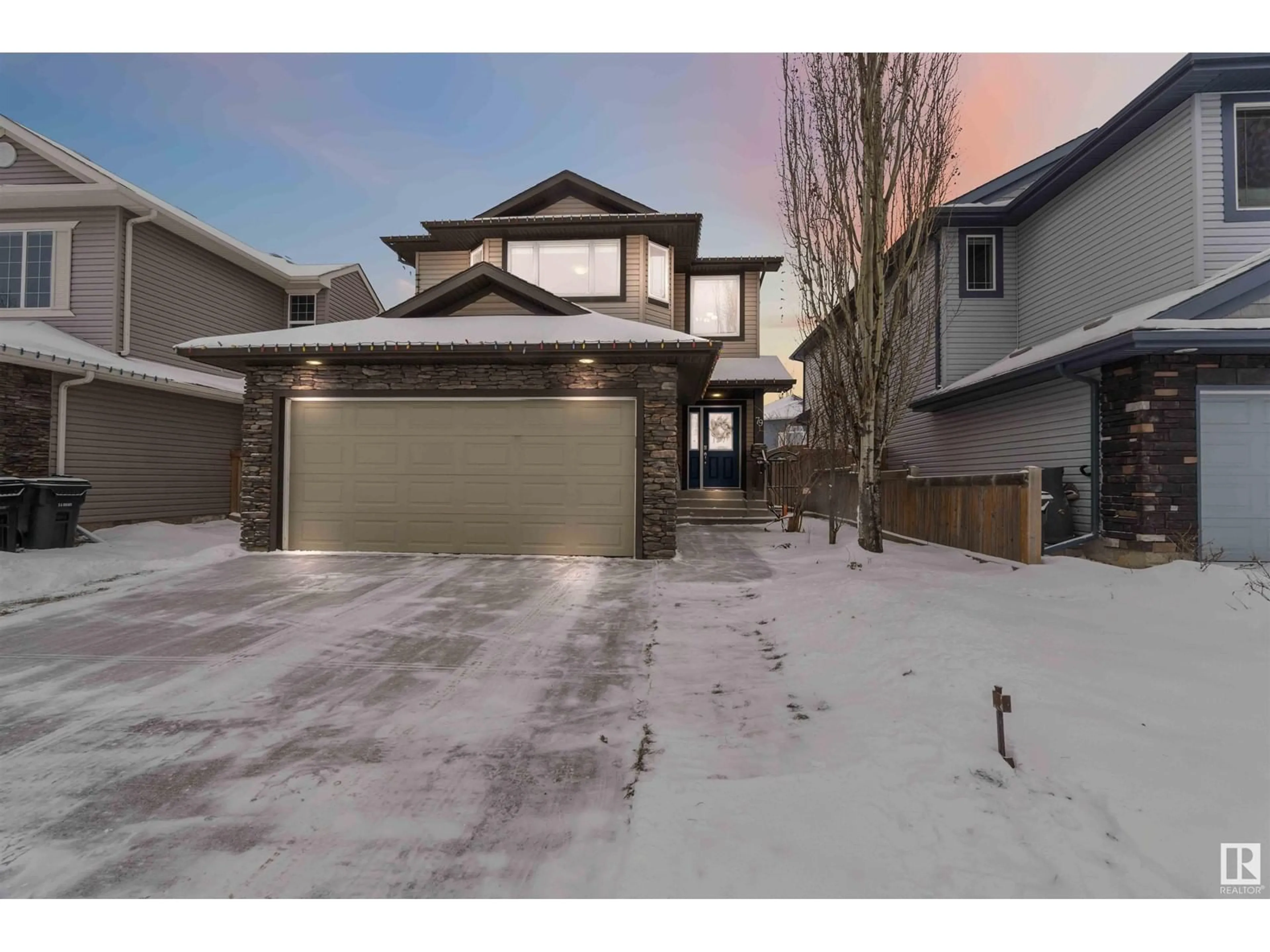 Frontside or backside of a home, the street view for 79 Avonlea Way, Spruce Grove Alberta T7X0H8