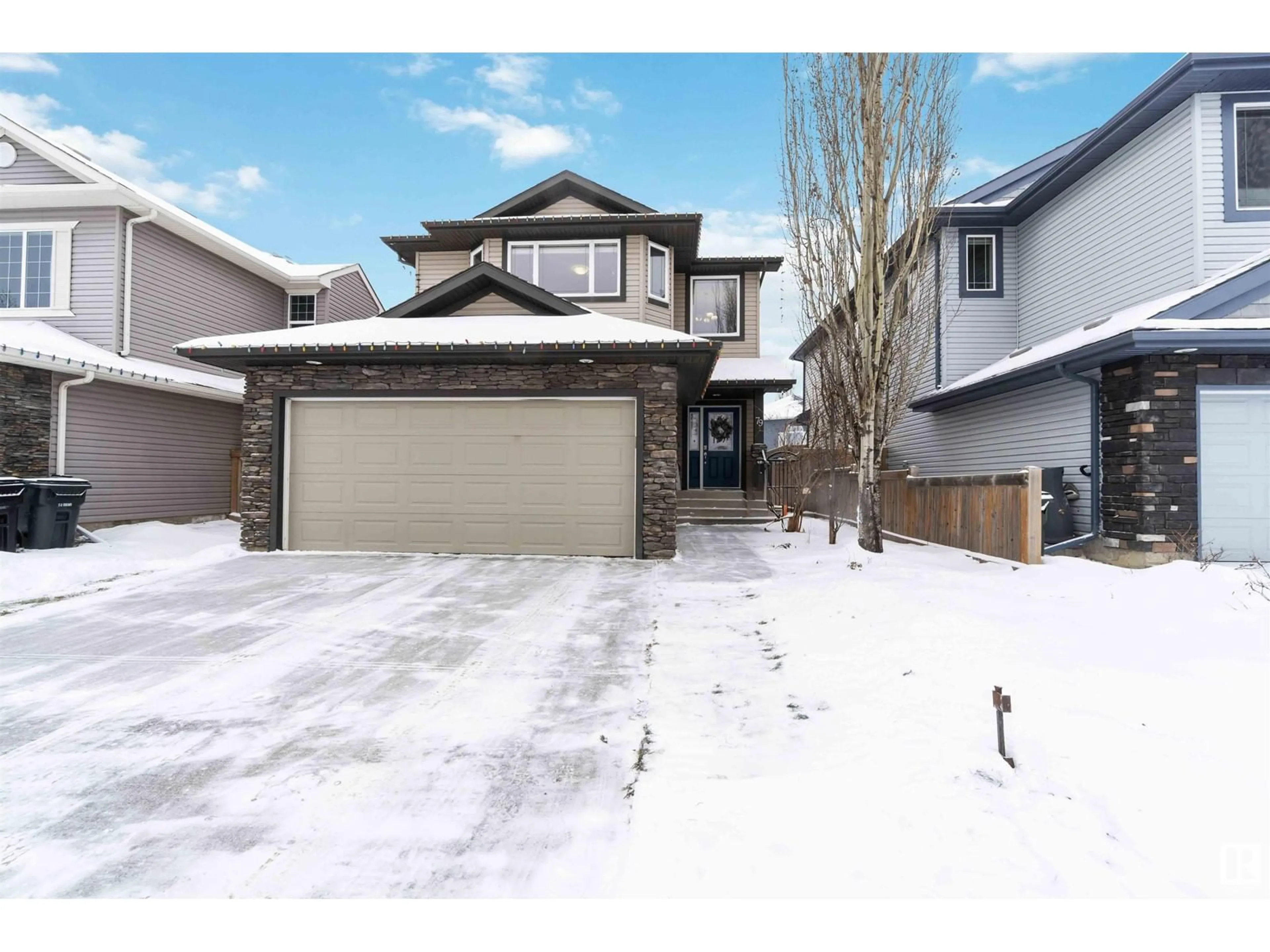 Frontside or backside of a home, the street view for 79 Avonlea Way, Spruce Grove Alberta T7X0H8