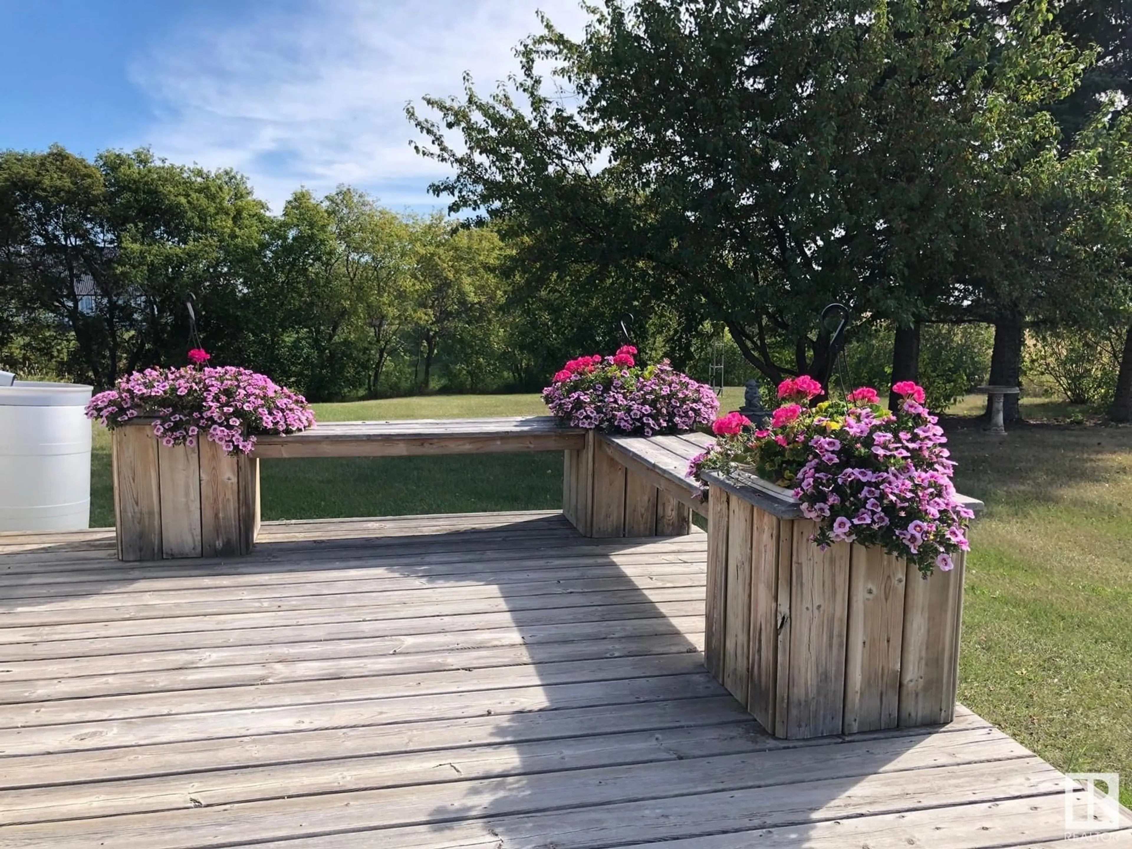 Patio, the fenced backyard for 11215 Twp Rd 581, Rural St. Paul County Alberta T0A2Y0