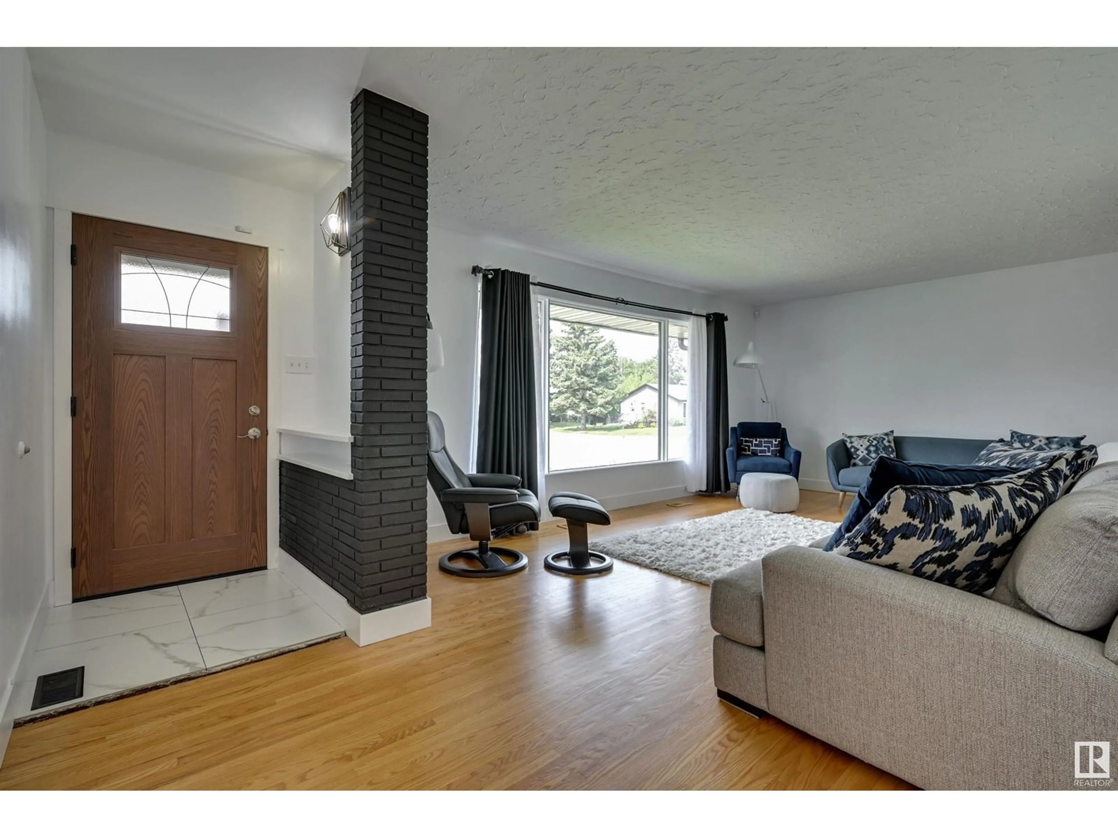 Living room, wood floors for 8431 152 ST NW, Edmonton Alberta T5R1L4