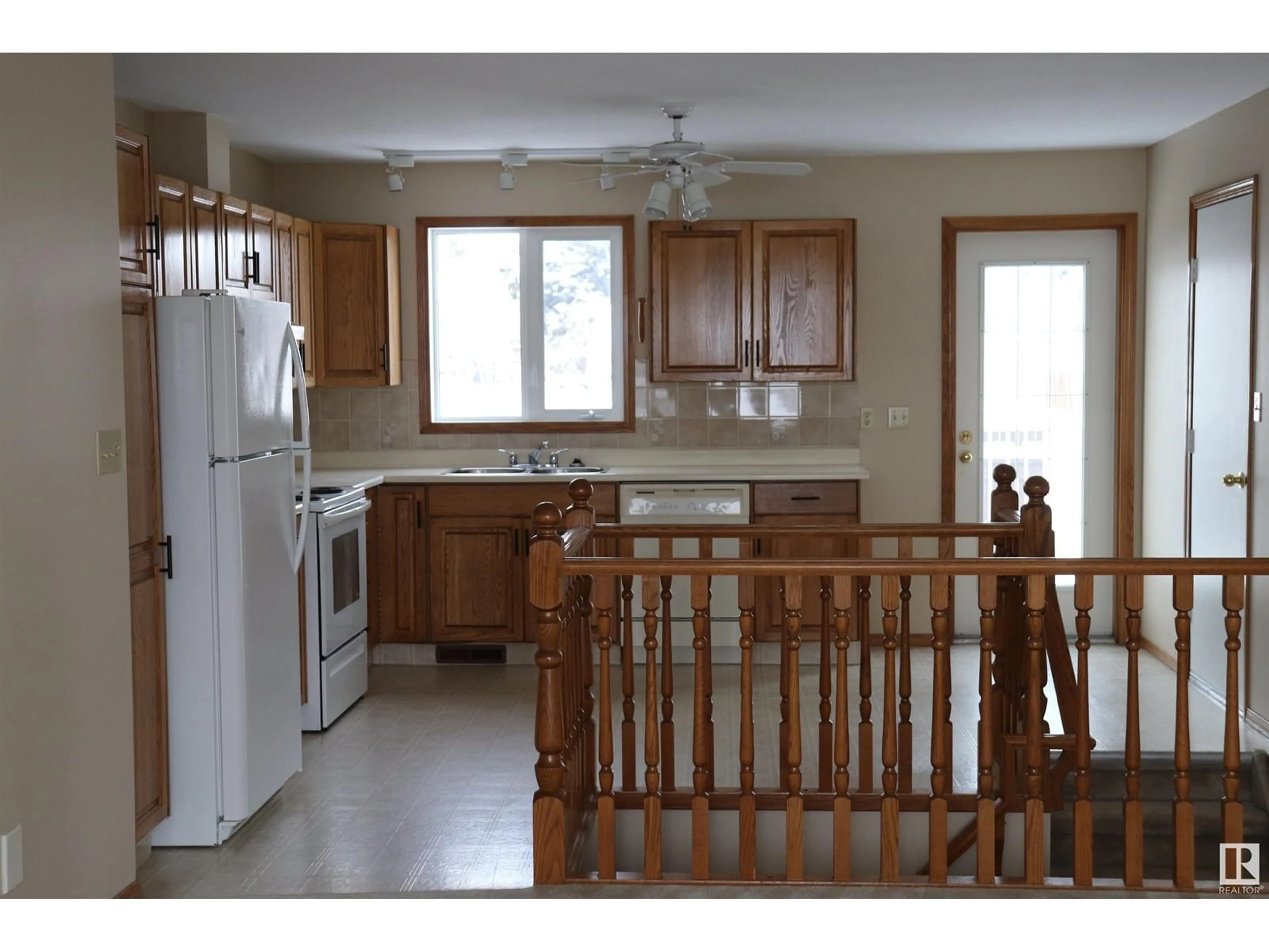 Open concept kitchen for #46 4410 52 Ave, Wetaskiwin Alberta T9A3M1