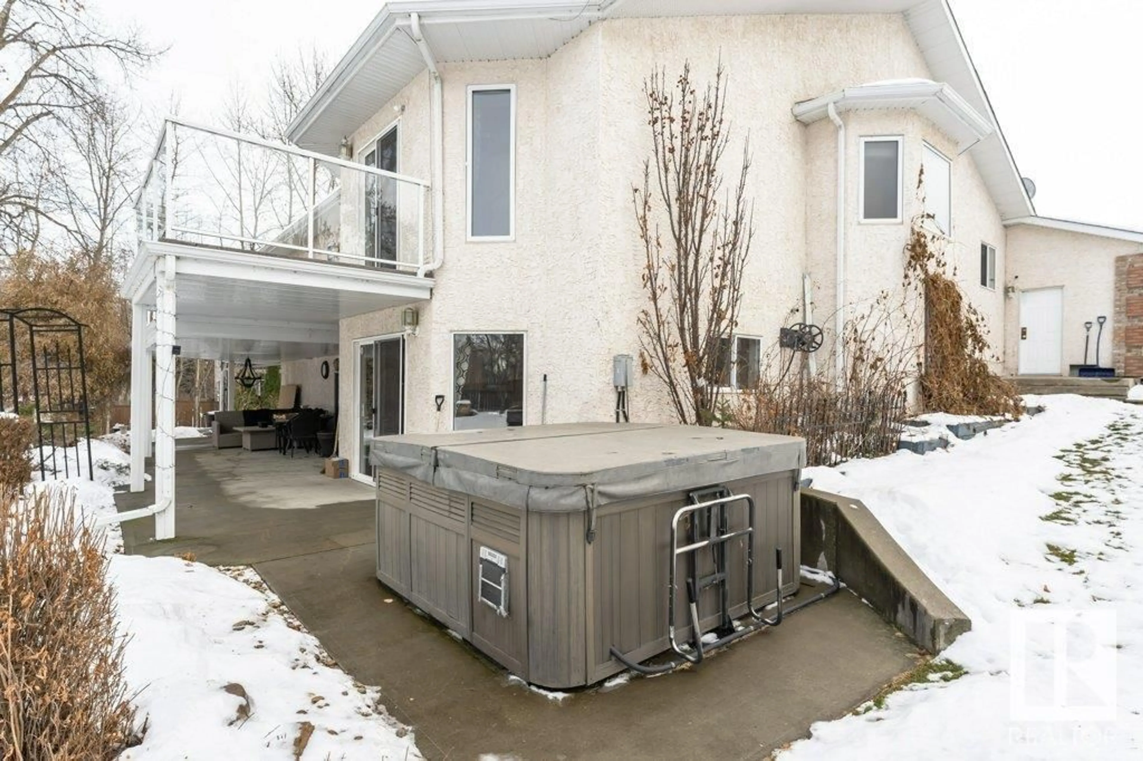 Frontside or backside of a home, the fenced backyard for 19 Frederick BV, Rural Parkland County Alberta T7Y1A3