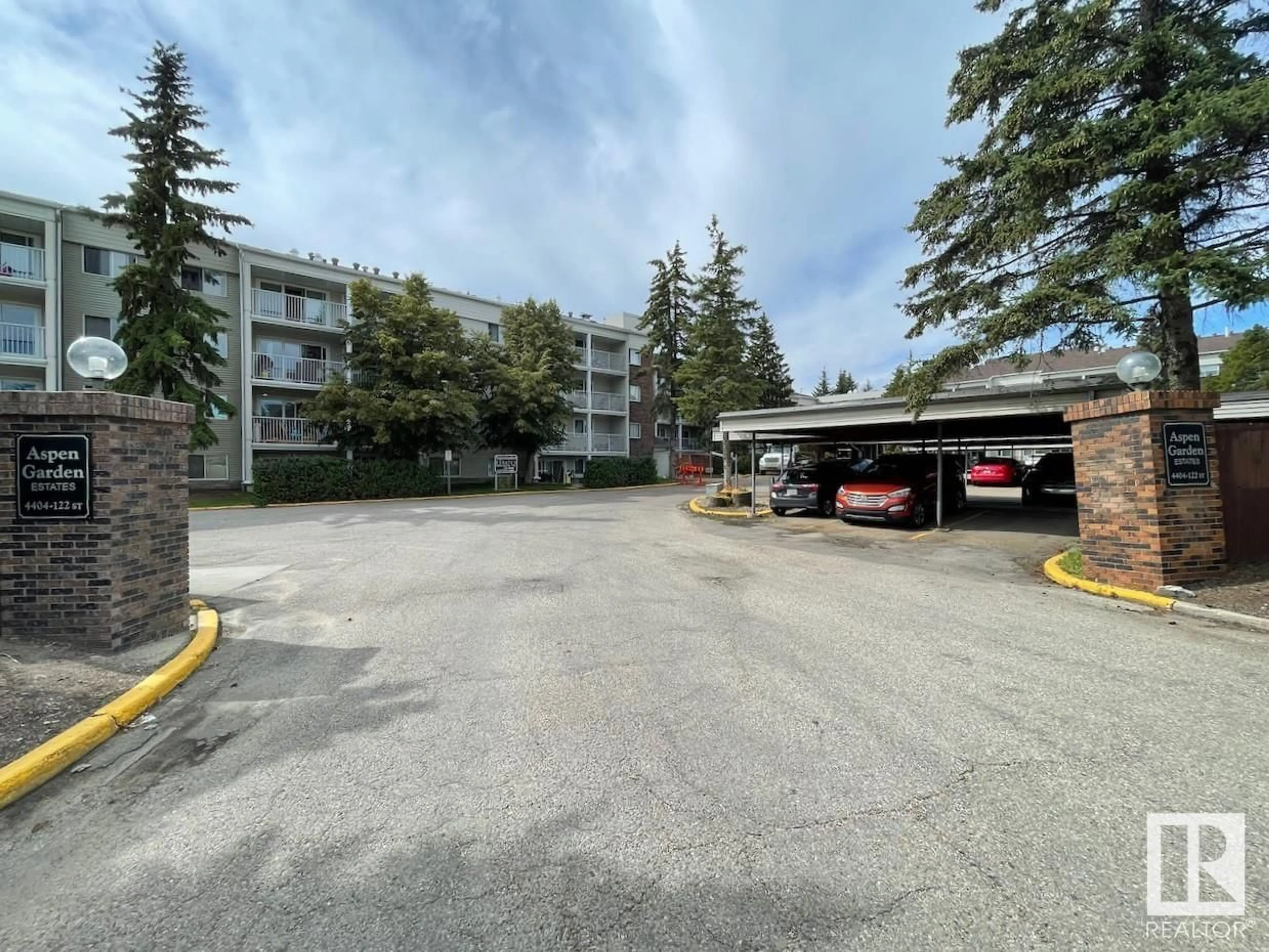 A pic from exterior of the house or condo, the street view for #310 4404 122 ST NW, Edmonton Alberta T6J4A9