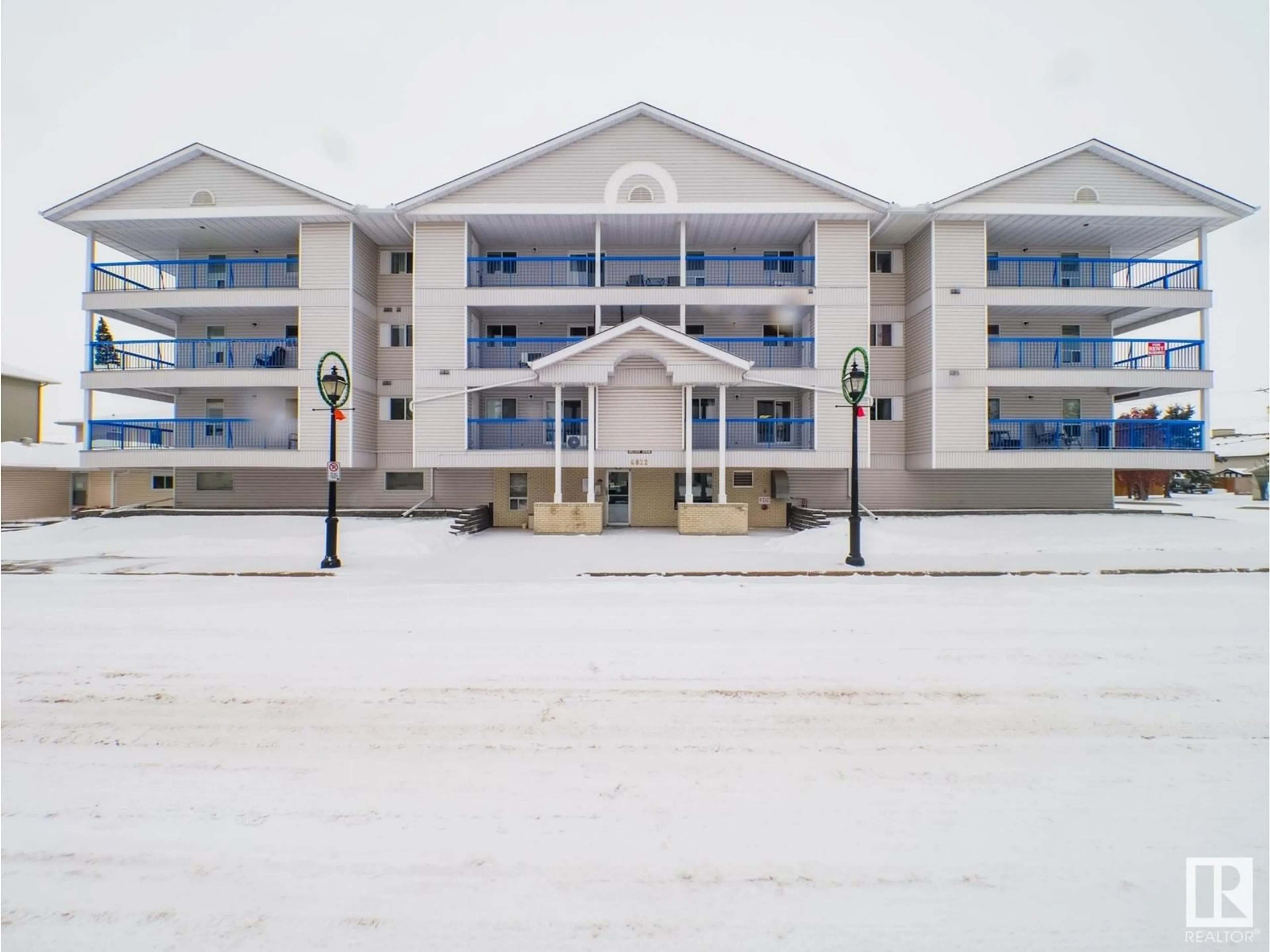 A pic from exterior of the house or condo, the front or back of building for #204 4812 51 AV, Stony Plain Alberta T7Z1X2