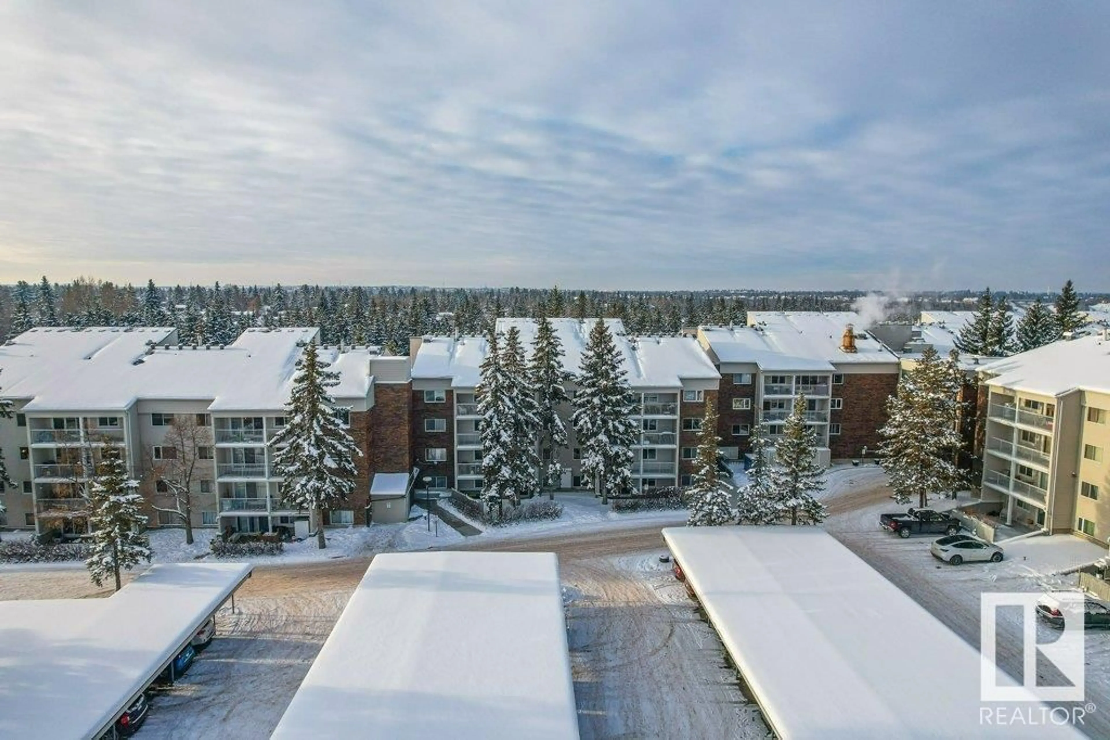 A pic from exterior of the house or condo, lake for #117 4404 122 ST NW, Edmonton Alberta T6J4A9