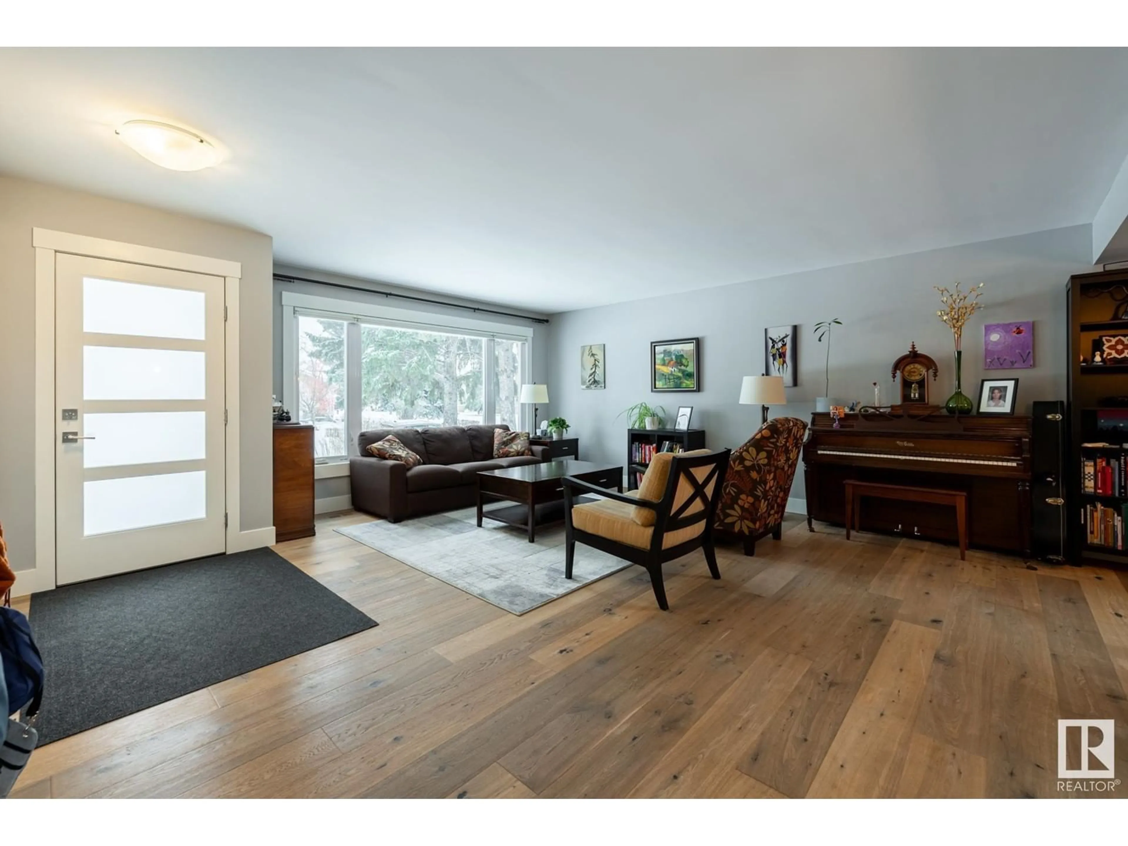 Living room, wood floors for 11207 58 AV NW, Edmonton Alberta T6H1C3