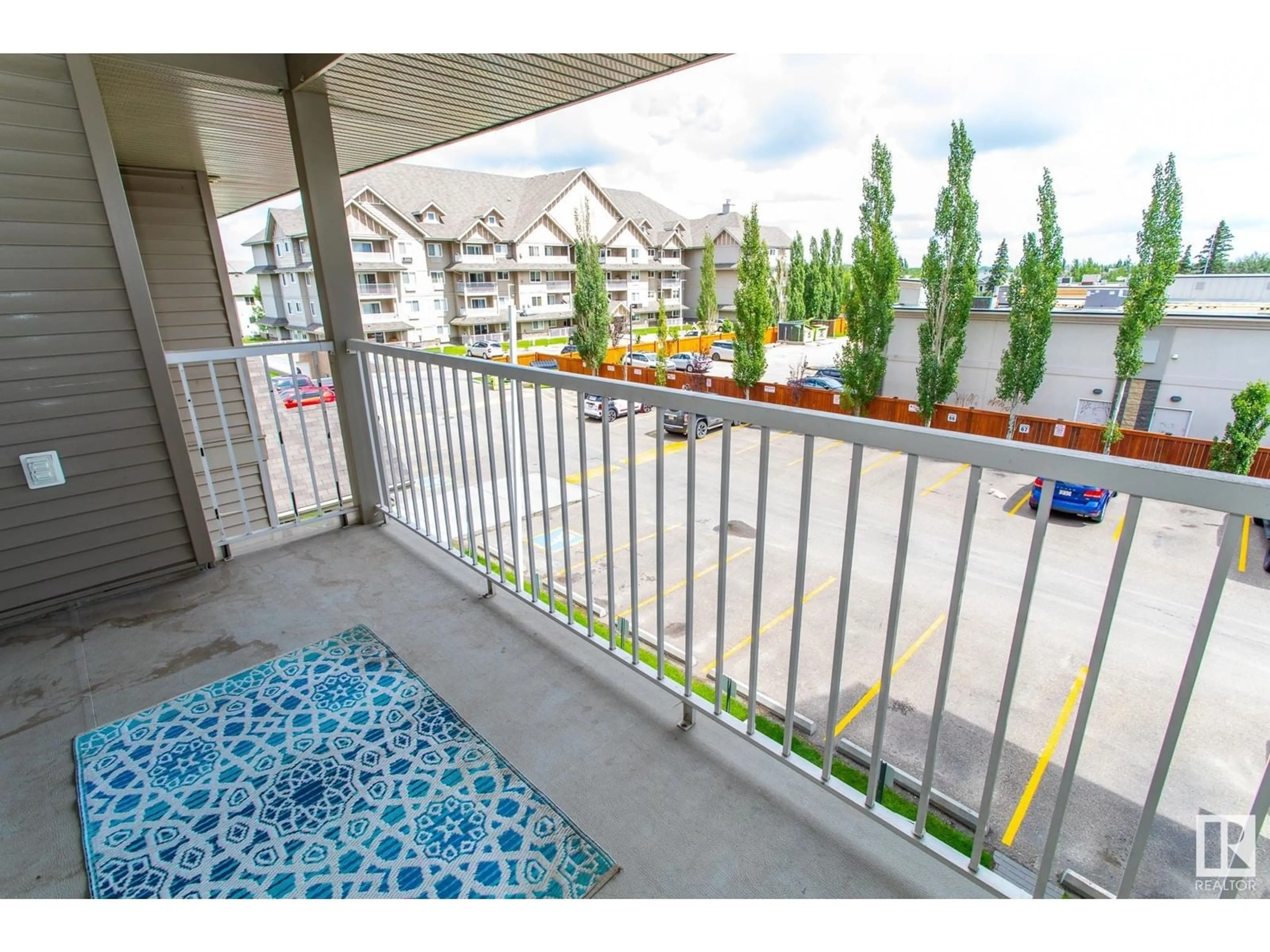 Balcony in the apartment, the fenced backyard for #310A 6 SPRUCE RIDGE DR, Spruce Grove Alberta T7X4M5