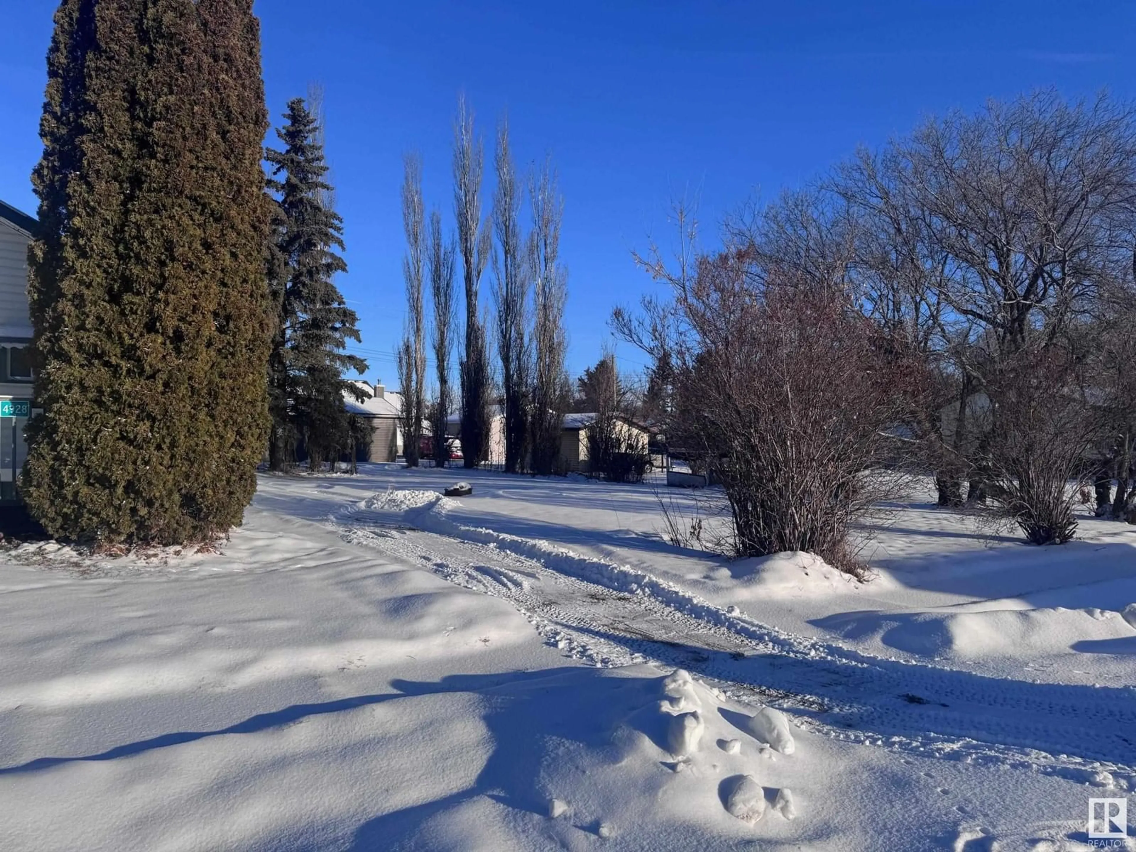 A pic from exterior of the house or condo, the street view for 4924 & 4928 49 AV, Vimy Alberta T0G2J0