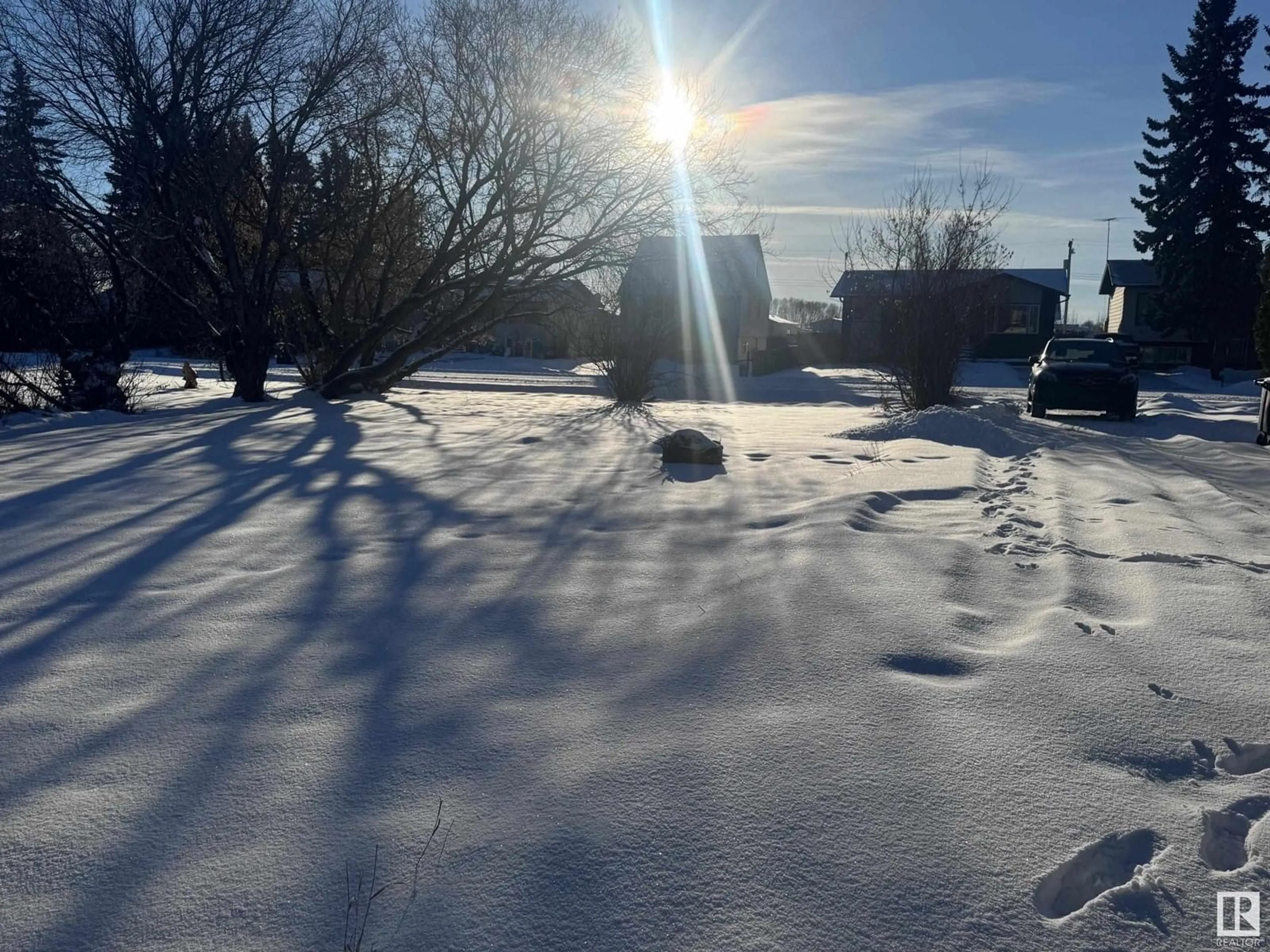 Frontside or backside of a home, the street view for 4924 & 4928 49 AV, Vimy Alberta T0G2J0