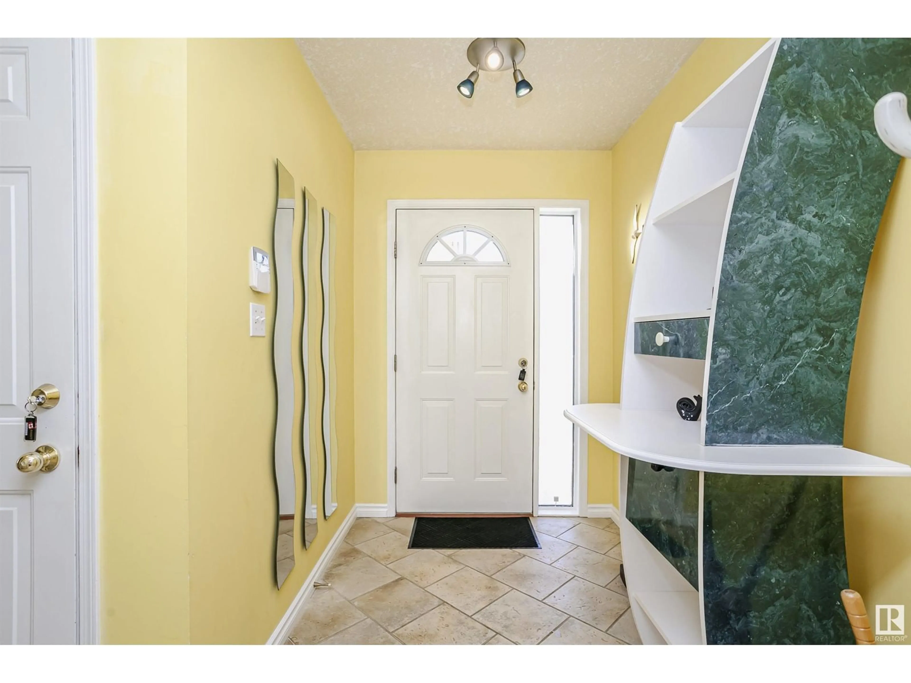 Indoor entryway, ceramic floors for 8904 170A AV NW, Edmonton Alberta T5Z2Y7