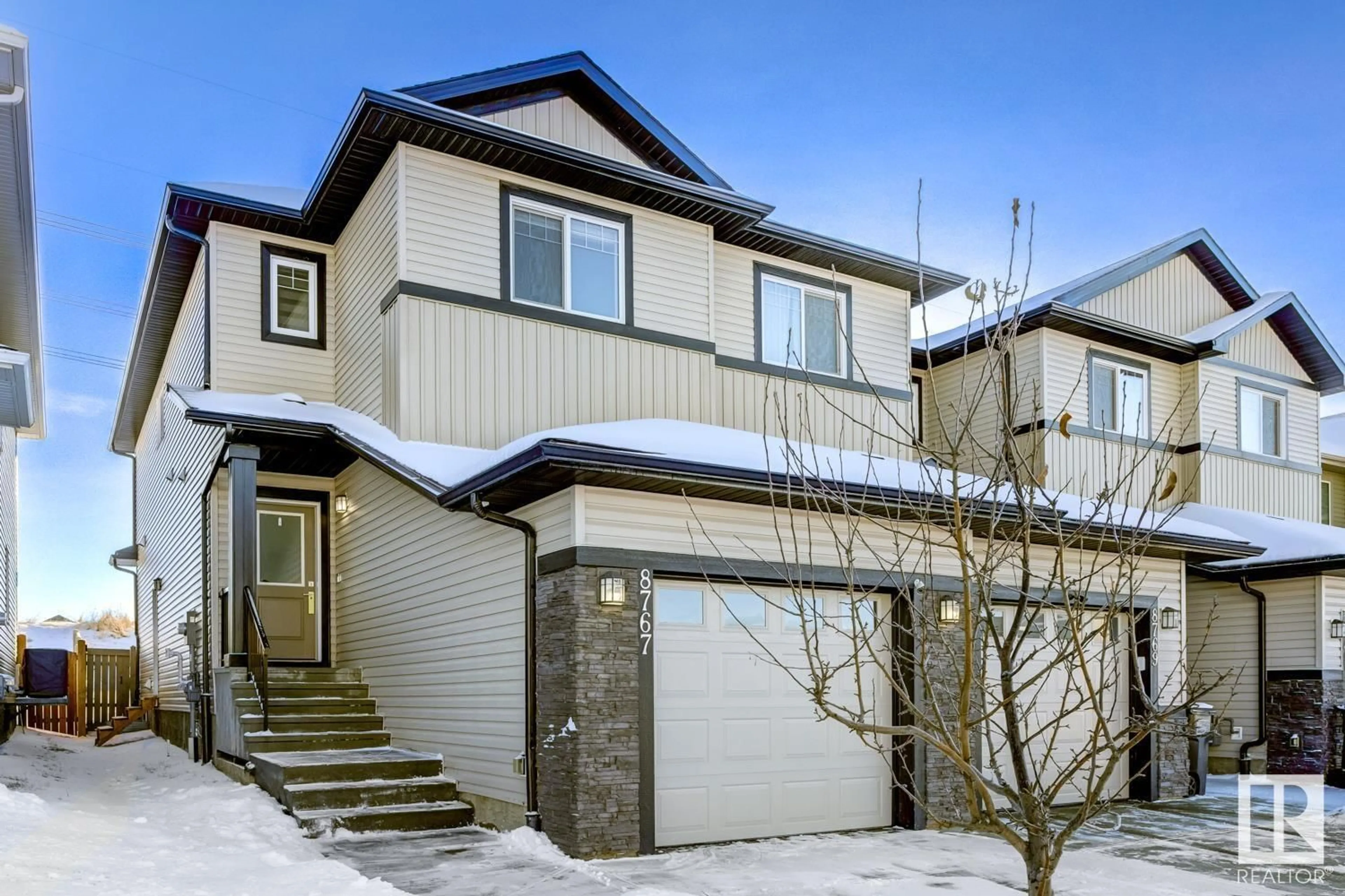 A pic from exterior of the house or condo, the fenced backyard for 8767 CARSON WY SW, Edmonton Alberta T6W4M3