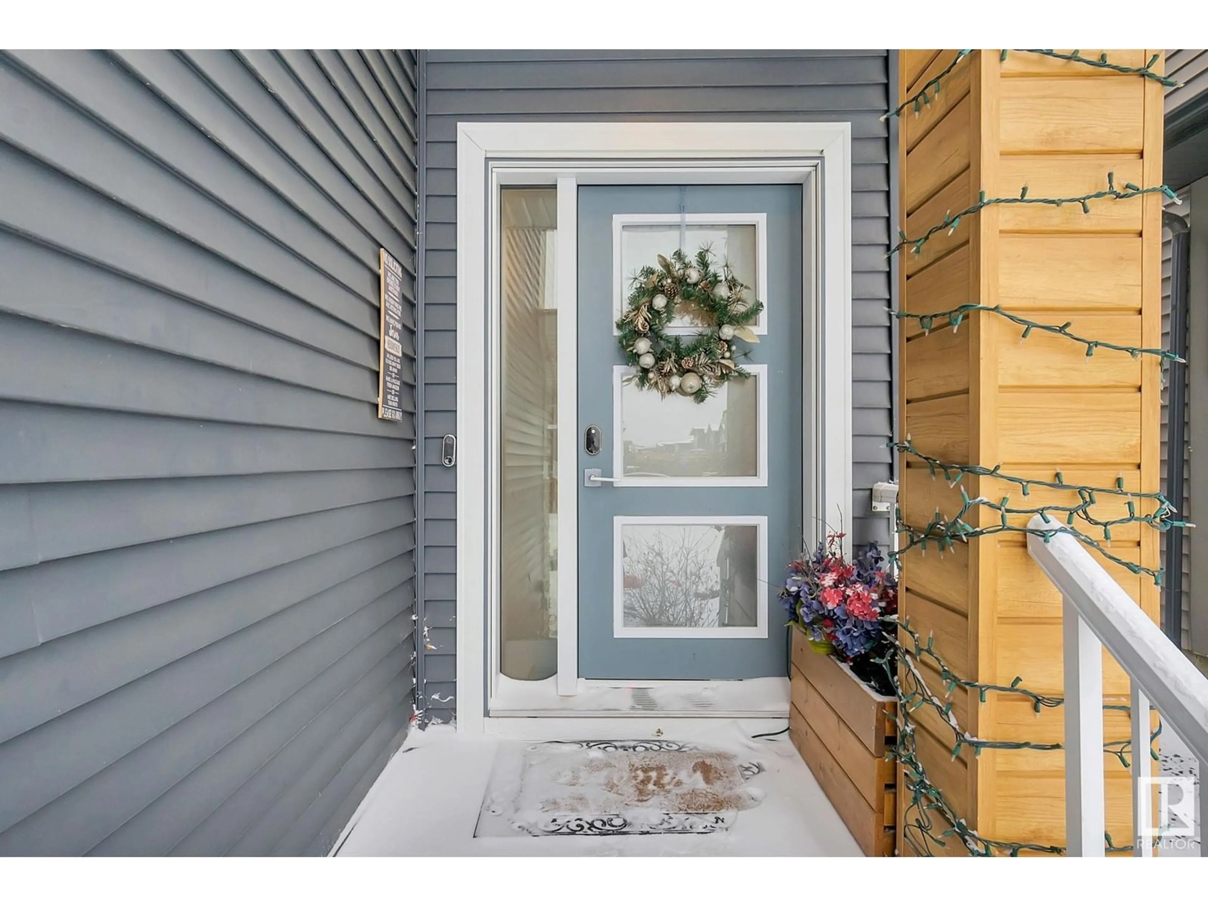 Indoor entryway, wood floors for 2306 KELLY CI SW, Edmonton Alberta T6W3S3