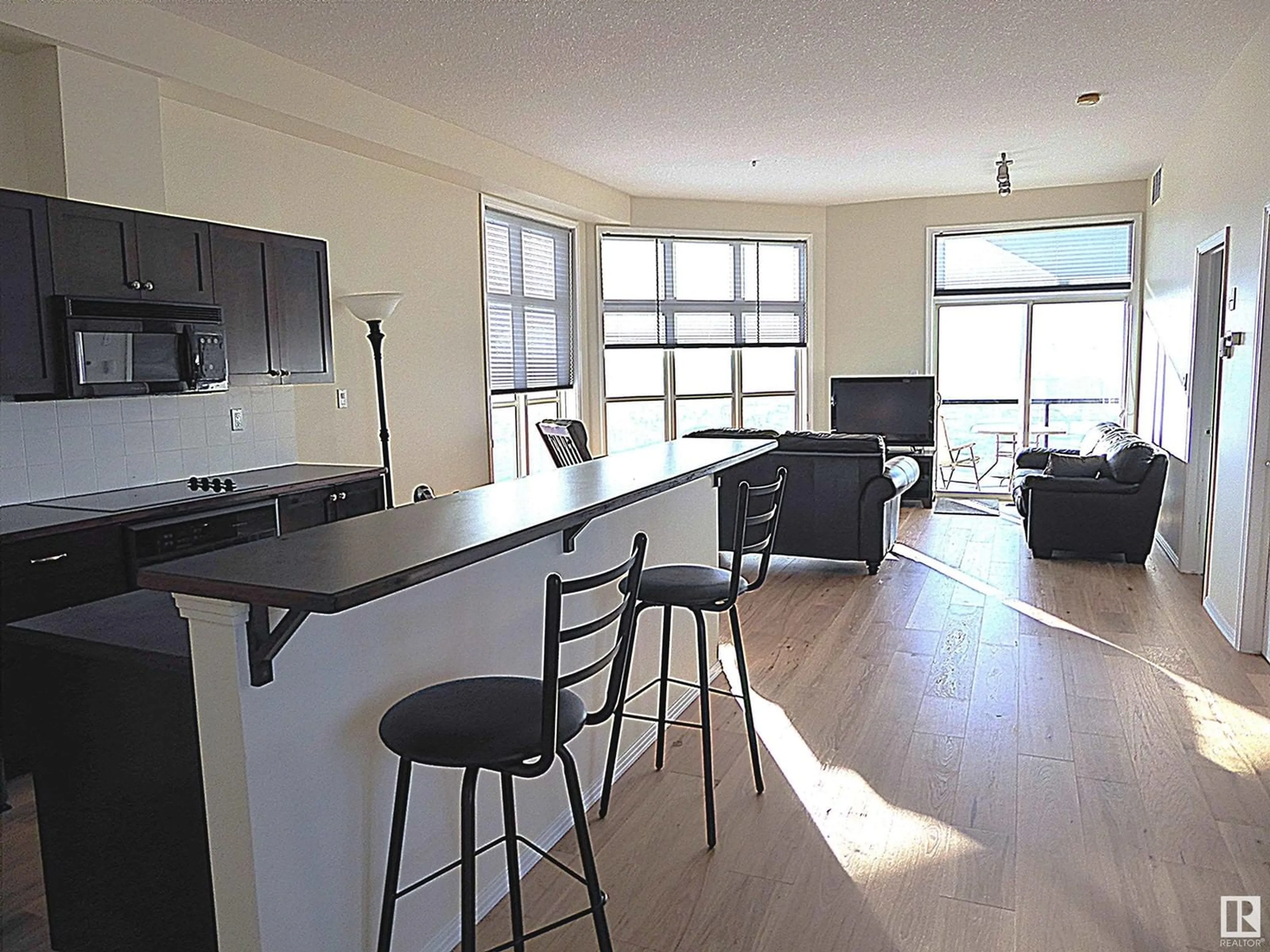 Open concept kitchen for #418 9507 101 AV NW NW, Edmonton Alberta T5H4R1