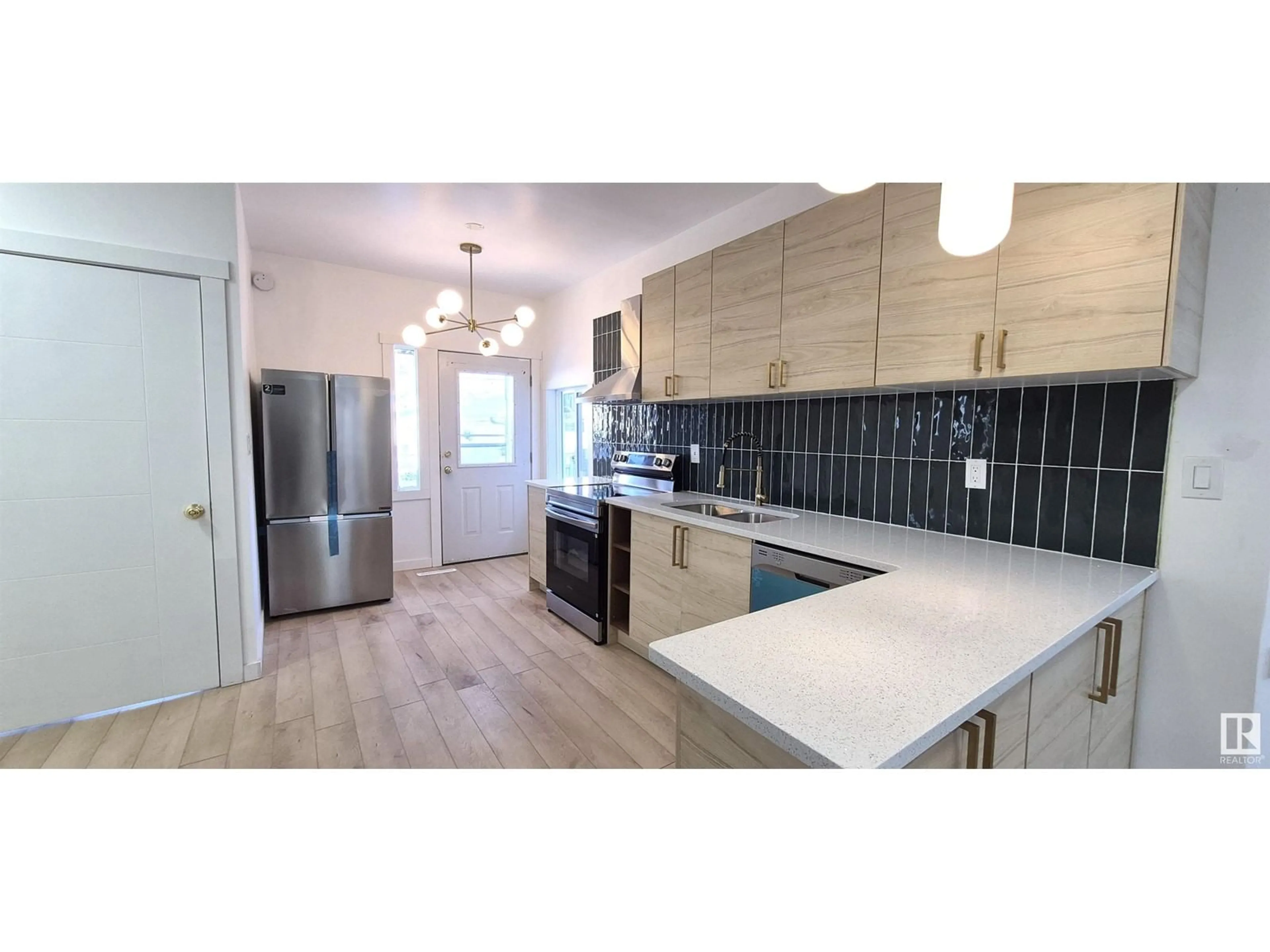 Open concept kitchen for 11919 96 ST NW, Edmonton Alberta T5G1V6