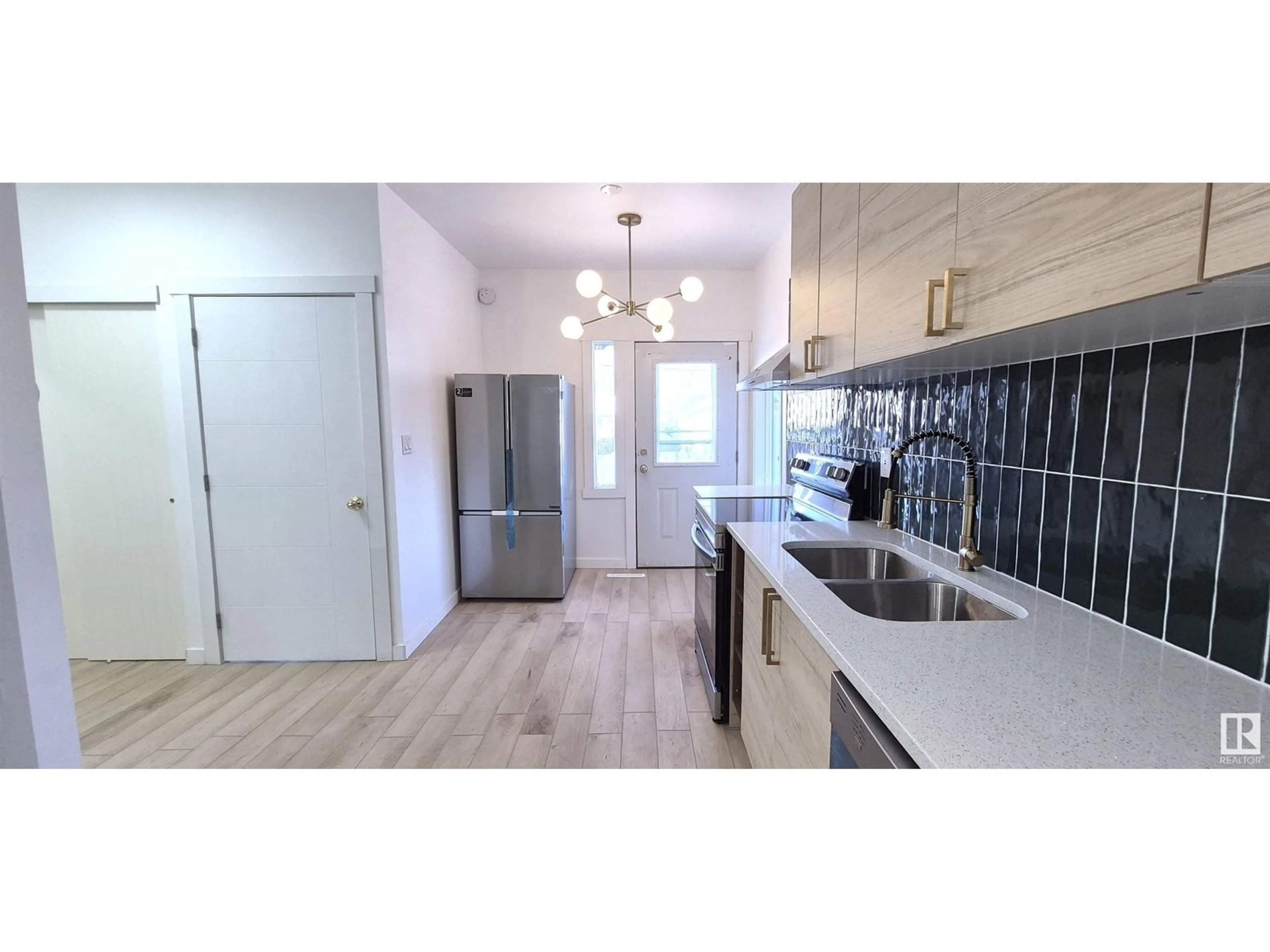 Open concept kitchen for 11919 96 ST NW, Edmonton Alberta T5G1V6