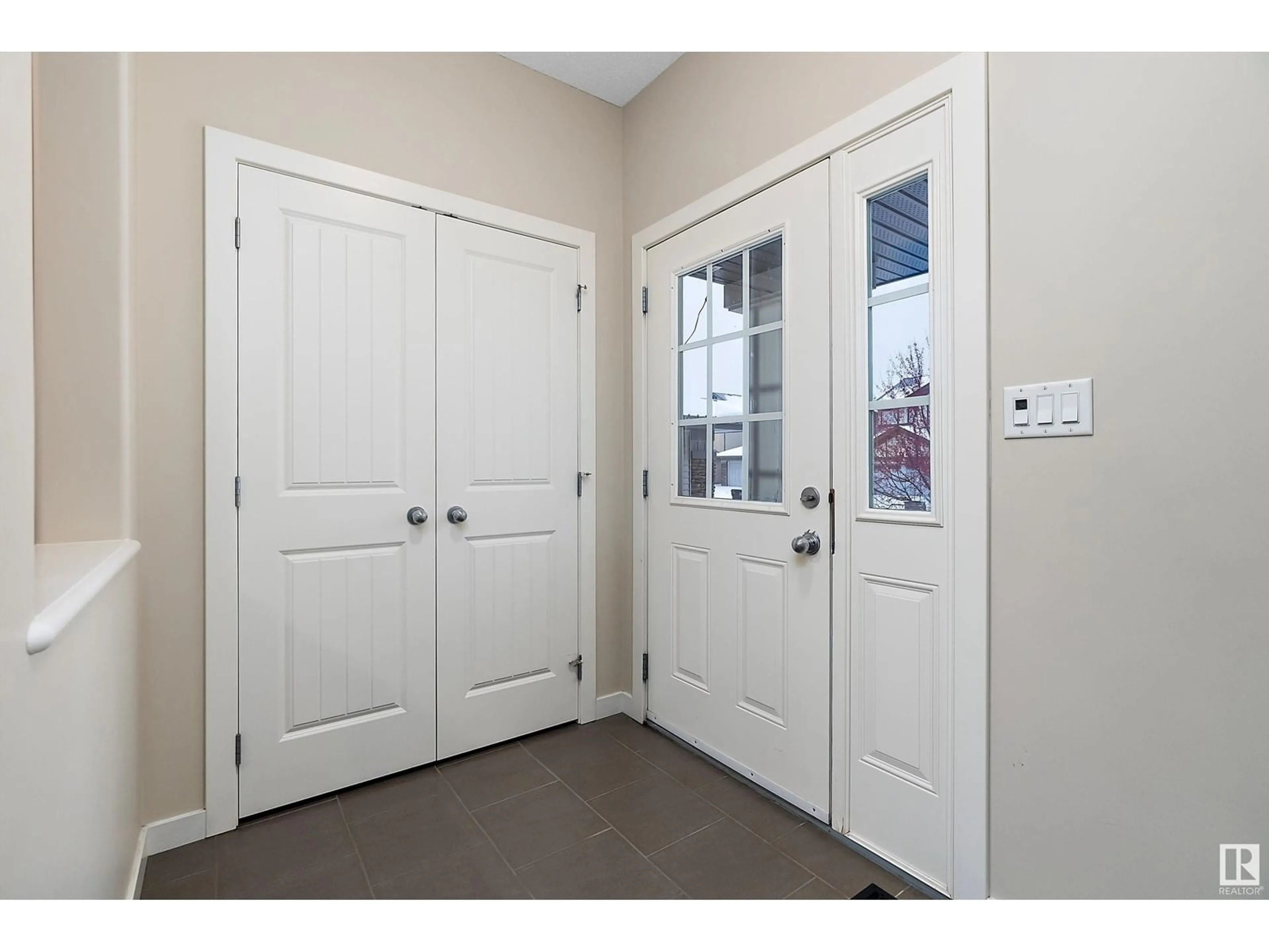 Indoor entryway, wood floors for 805 ARMITAGE WD SW, Edmonton Alberta T6W0H3