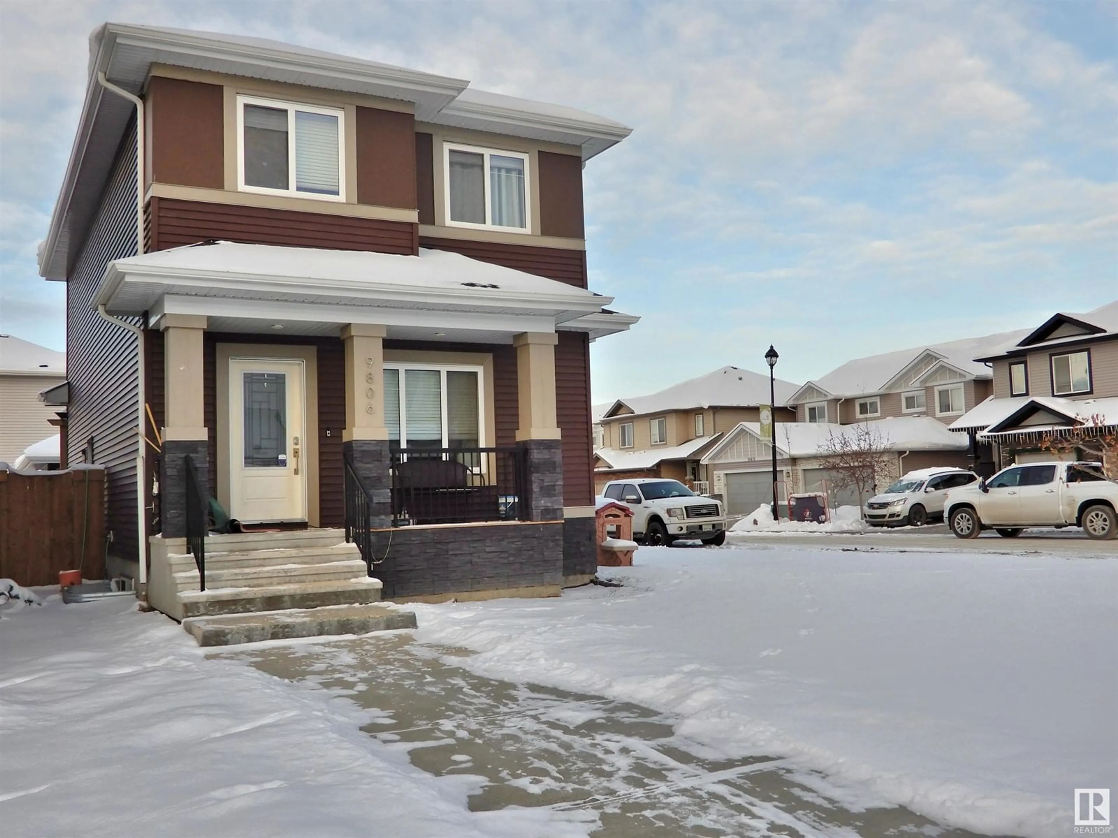 A pic from exterior of the house or condo, the street view for 9806 106 AV, Morinville Alberta T8R2P2