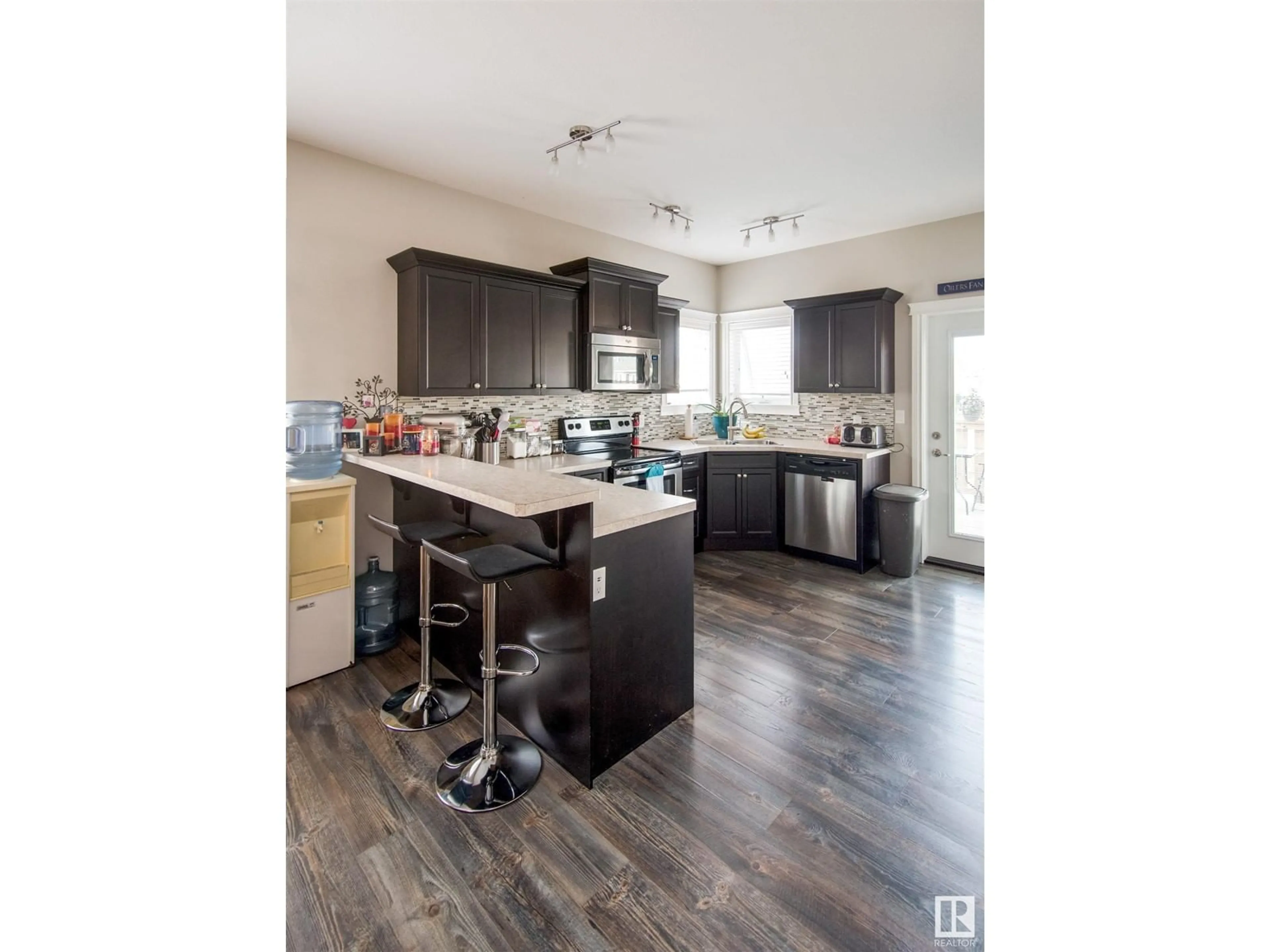 Open concept kitchen for 4710 38A ST, Bonnyville Town Alberta T9N0E2