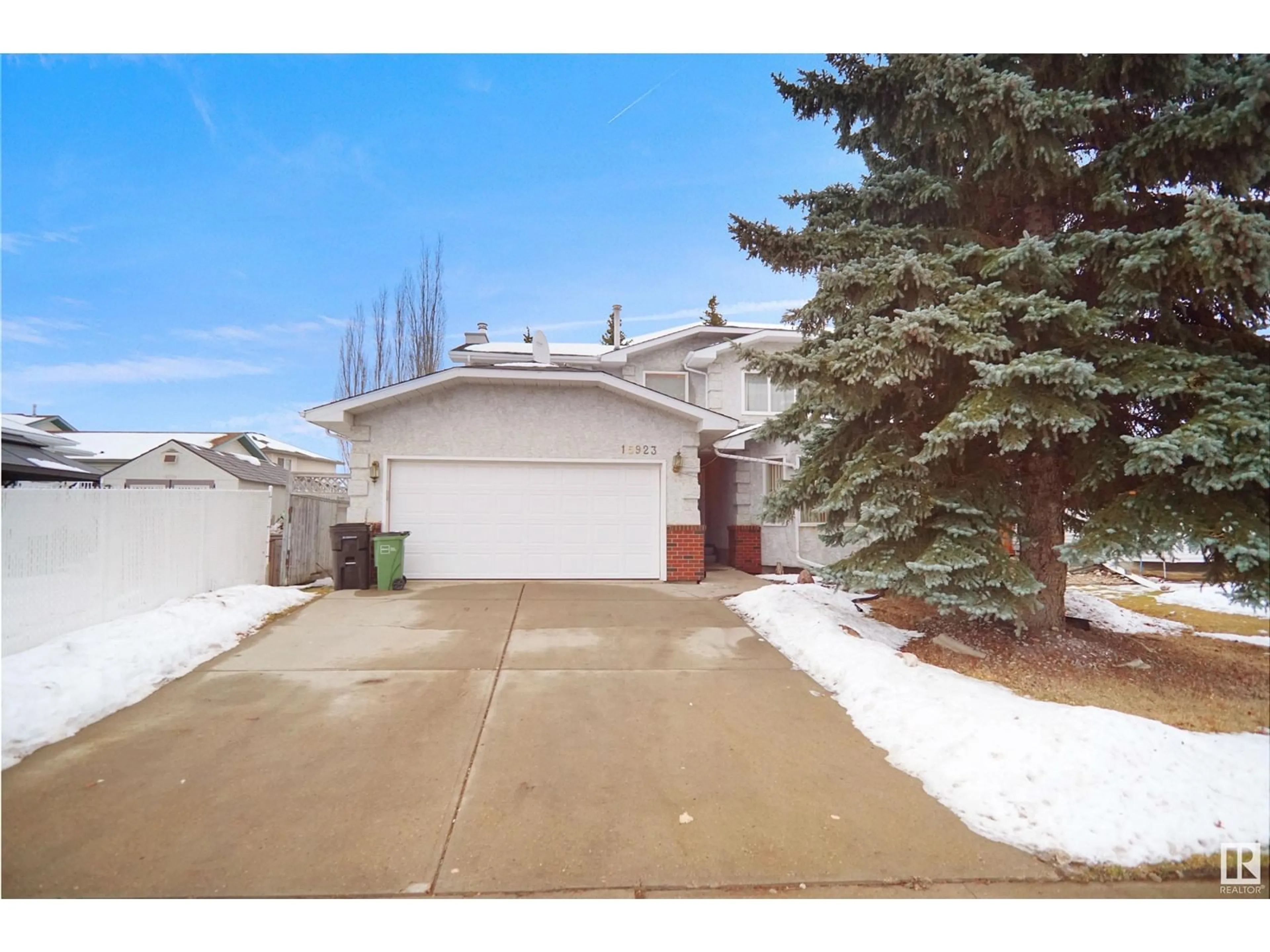 Frontside or backside of a home, the fenced backyard for 15923 129 ST NW, Edmonton Alberta T6V1B3