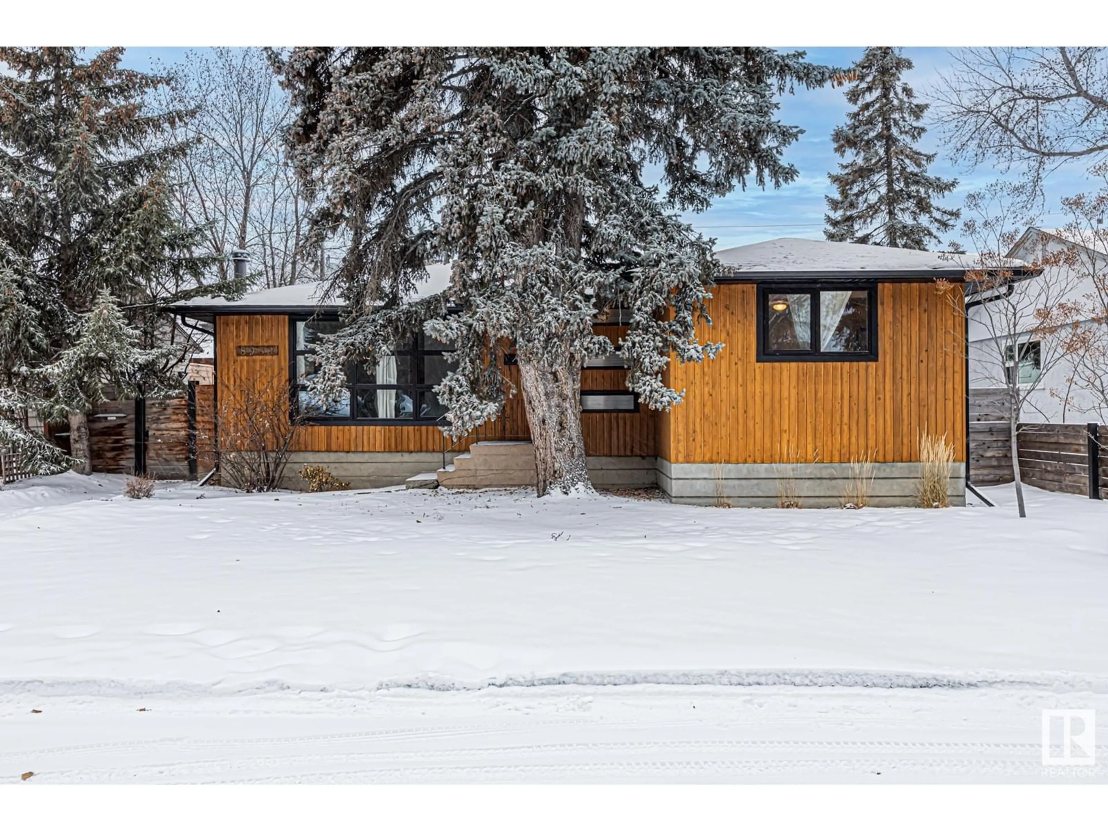 Frontside or backside of a home, cottage for 8932 142 ST NW, Edmonton Alberta T5R0M5