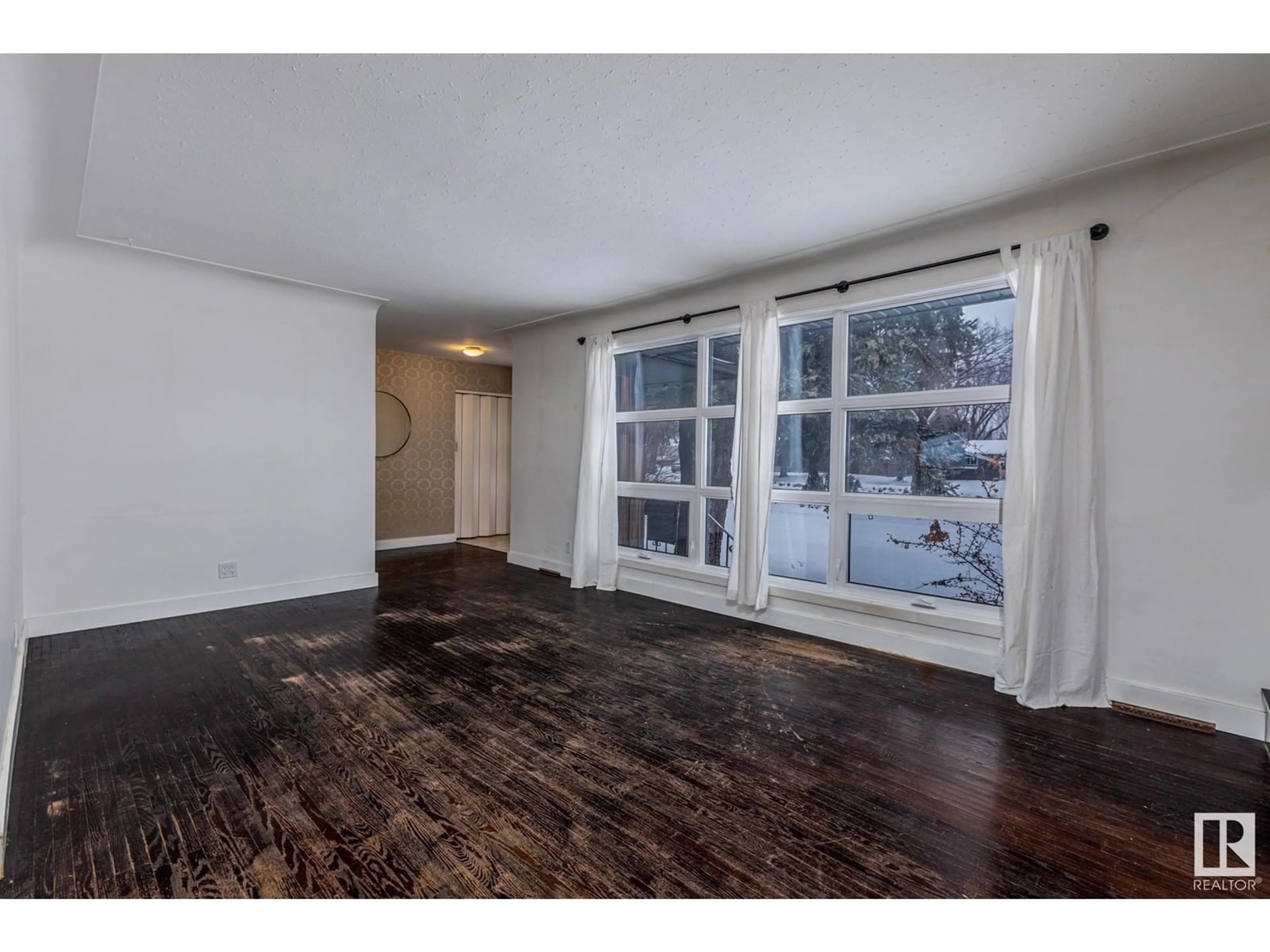 A pic of a room, wood floors for 8932 142 ST NW, Edmonton Alberta T5R0M5