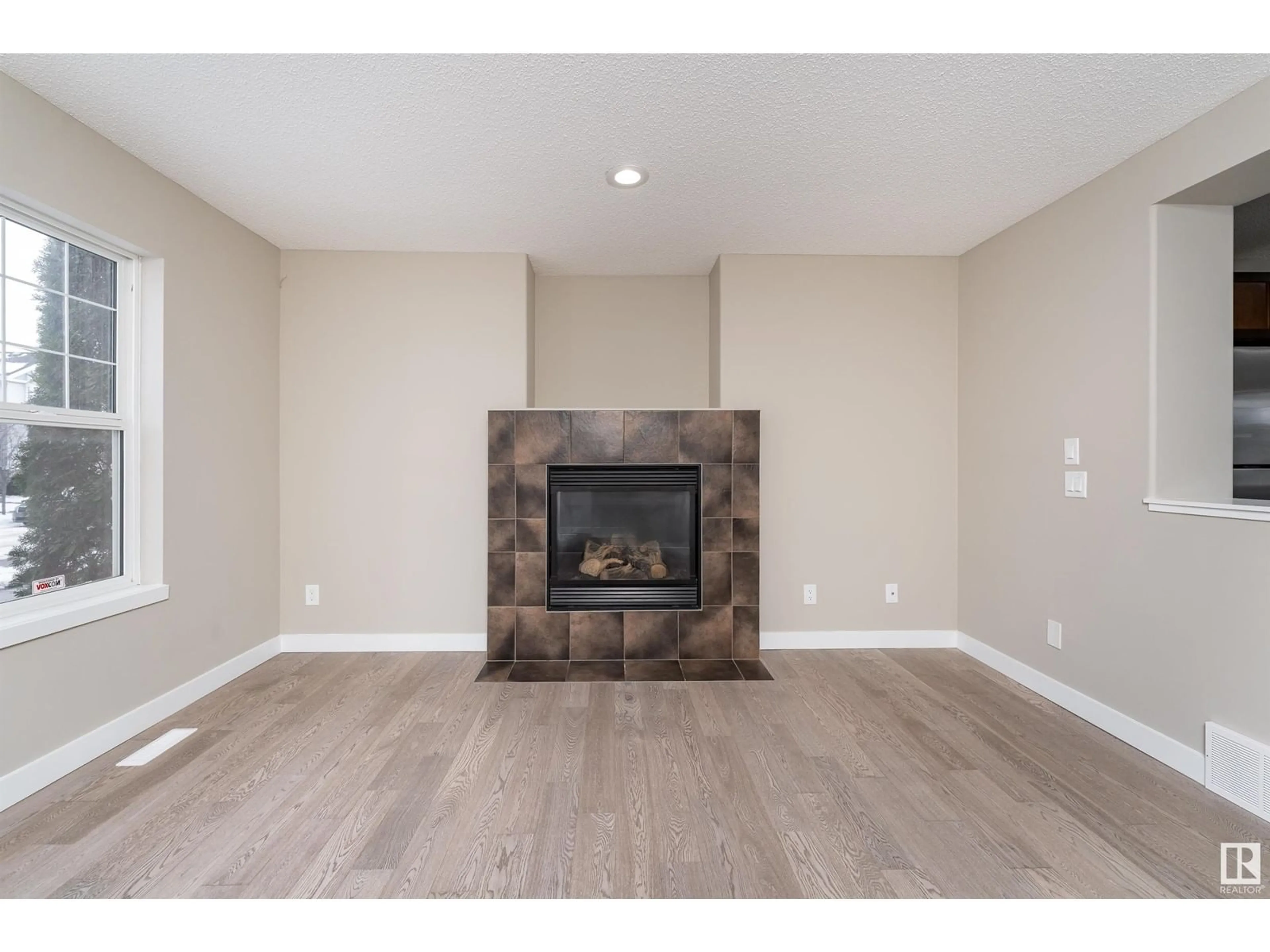 A pic of a room, wood floors for 116 61 ST SW, Edmonton Alberta T6X0E7