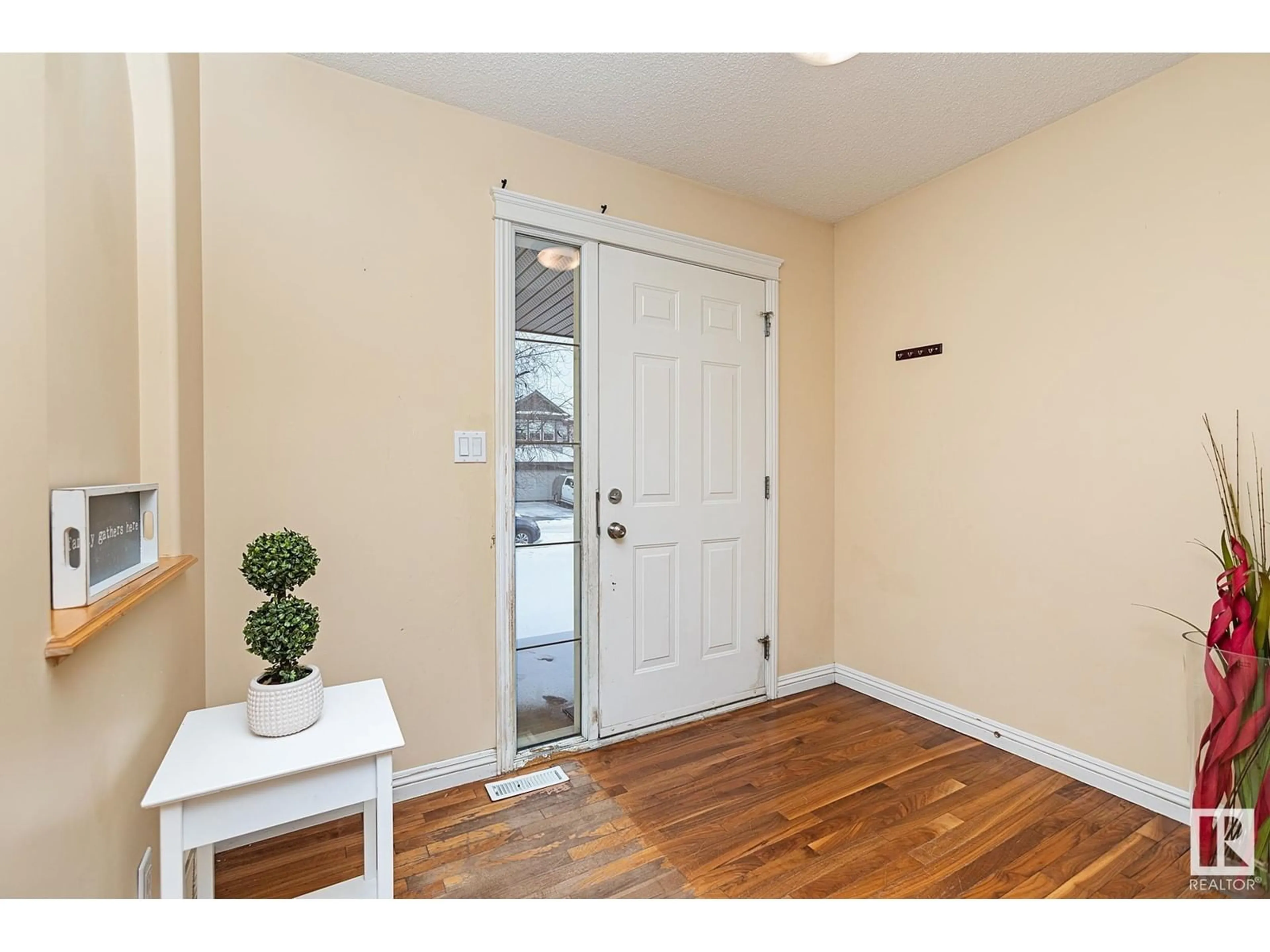 Indoor entryway, wood floors for 1120 117 ST SW, Edmonton Alberta T6W1W9