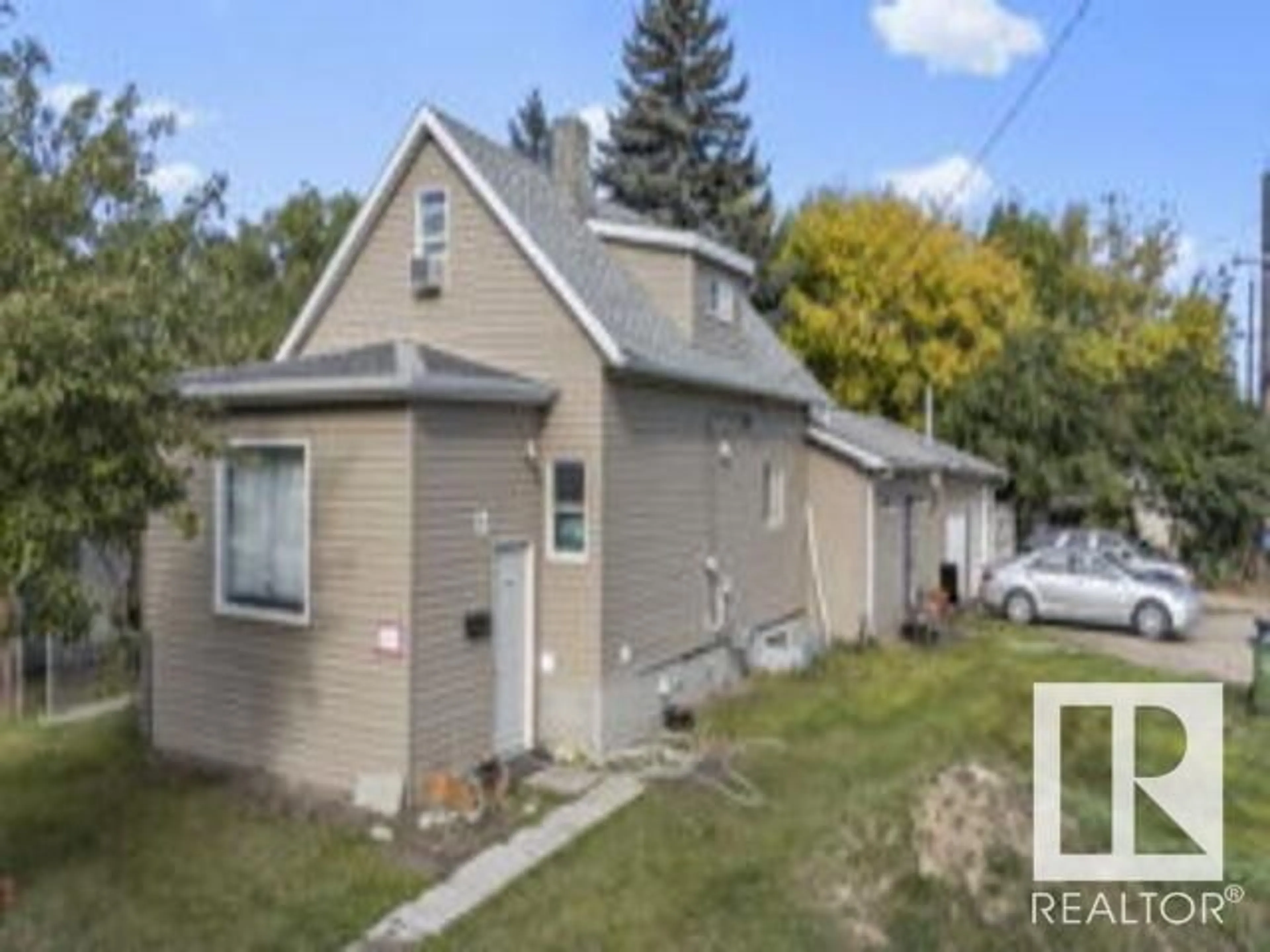 Frontside or backside of a home, the street view for 12524 129 AV NW, Edmonton Alberta T5L3J5