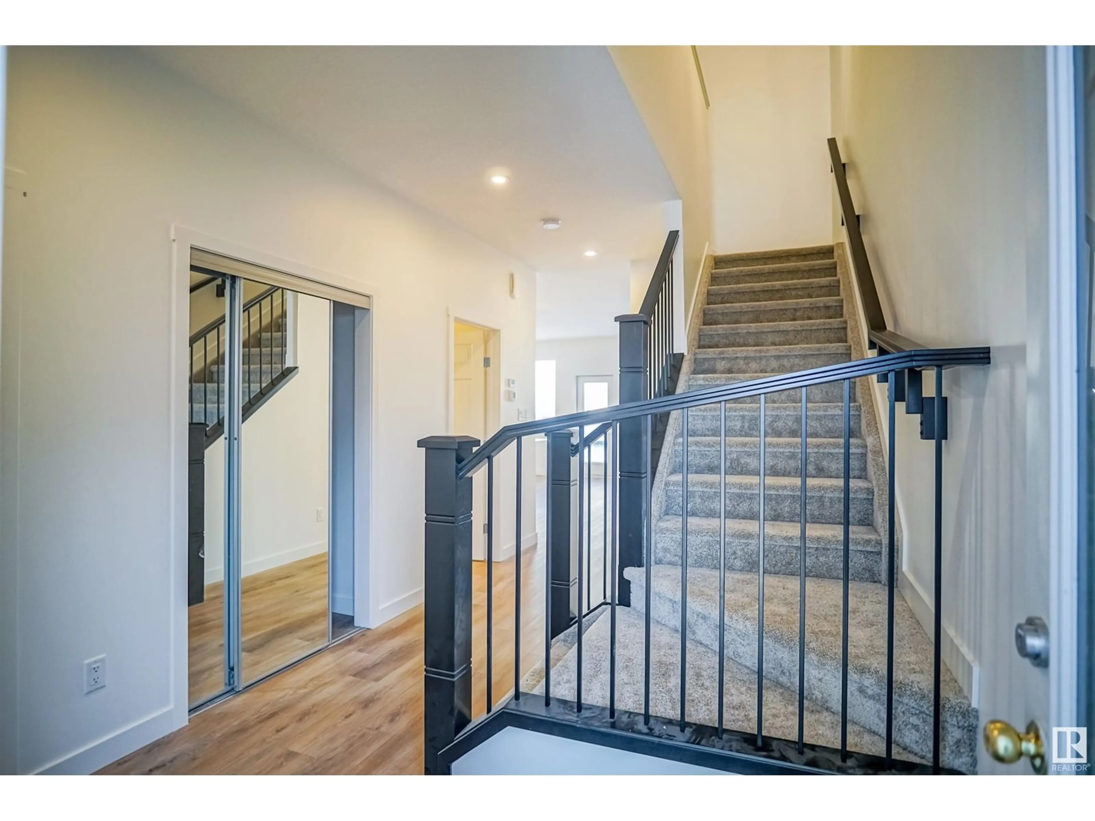 Indoor foyer, wood floors for 9712 Carson PL SW, Edmonton Alberta T6W5P9