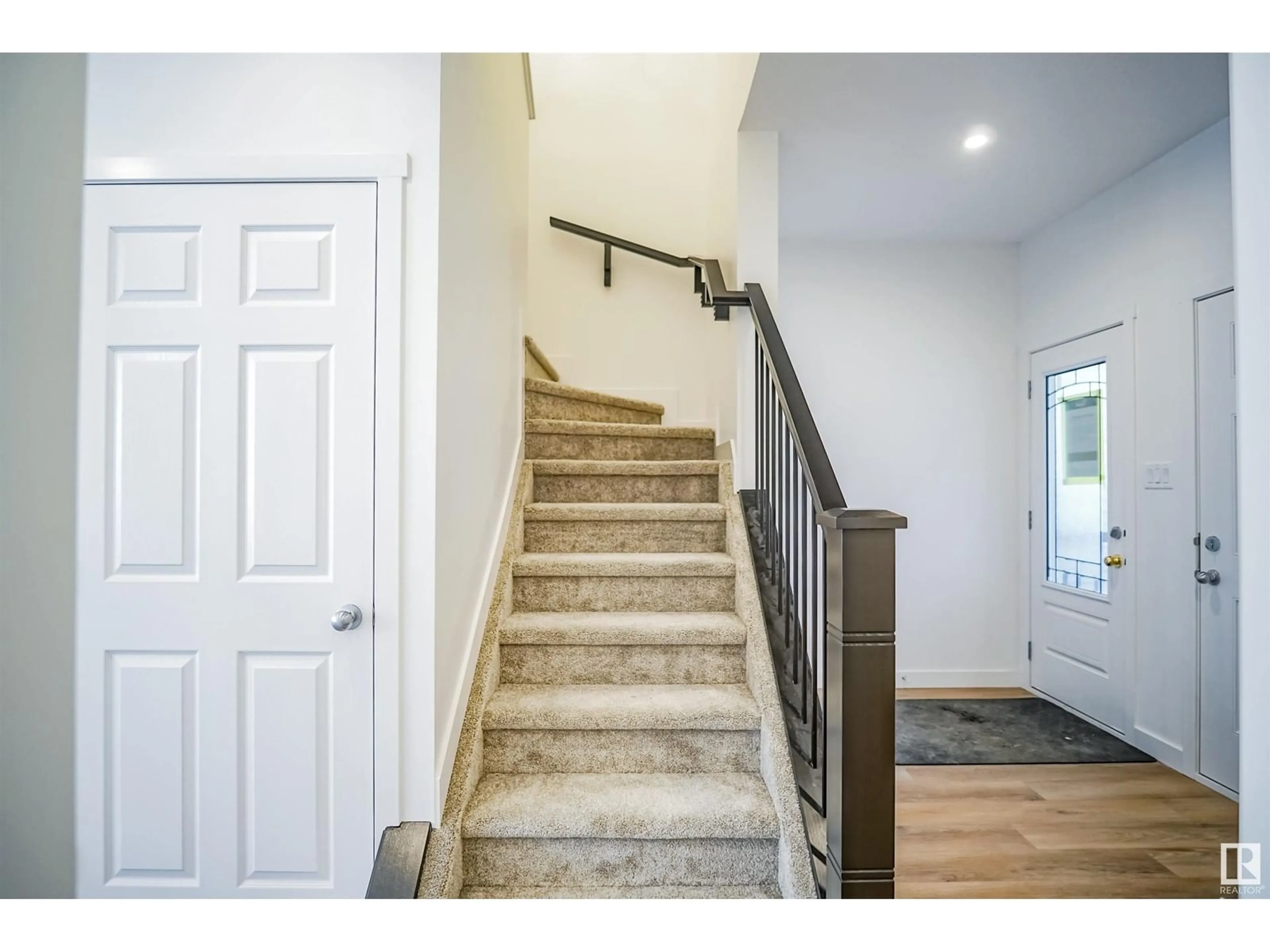 Indoor entryway, wood floors for 9708 Carson PL SW, Edmonton Alberta T6W5P9