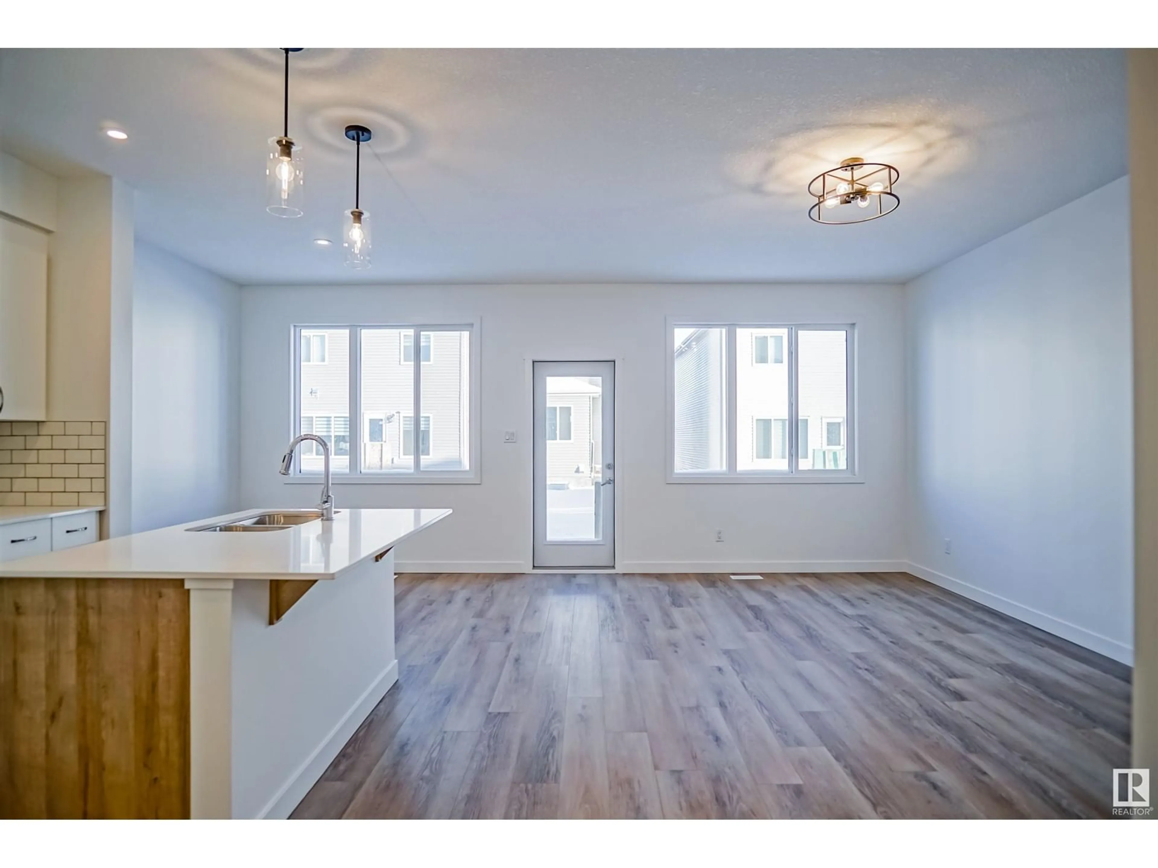 Open concept kitchen for 9708 Carson PL SW, Edmonton Alberta T6W5P9