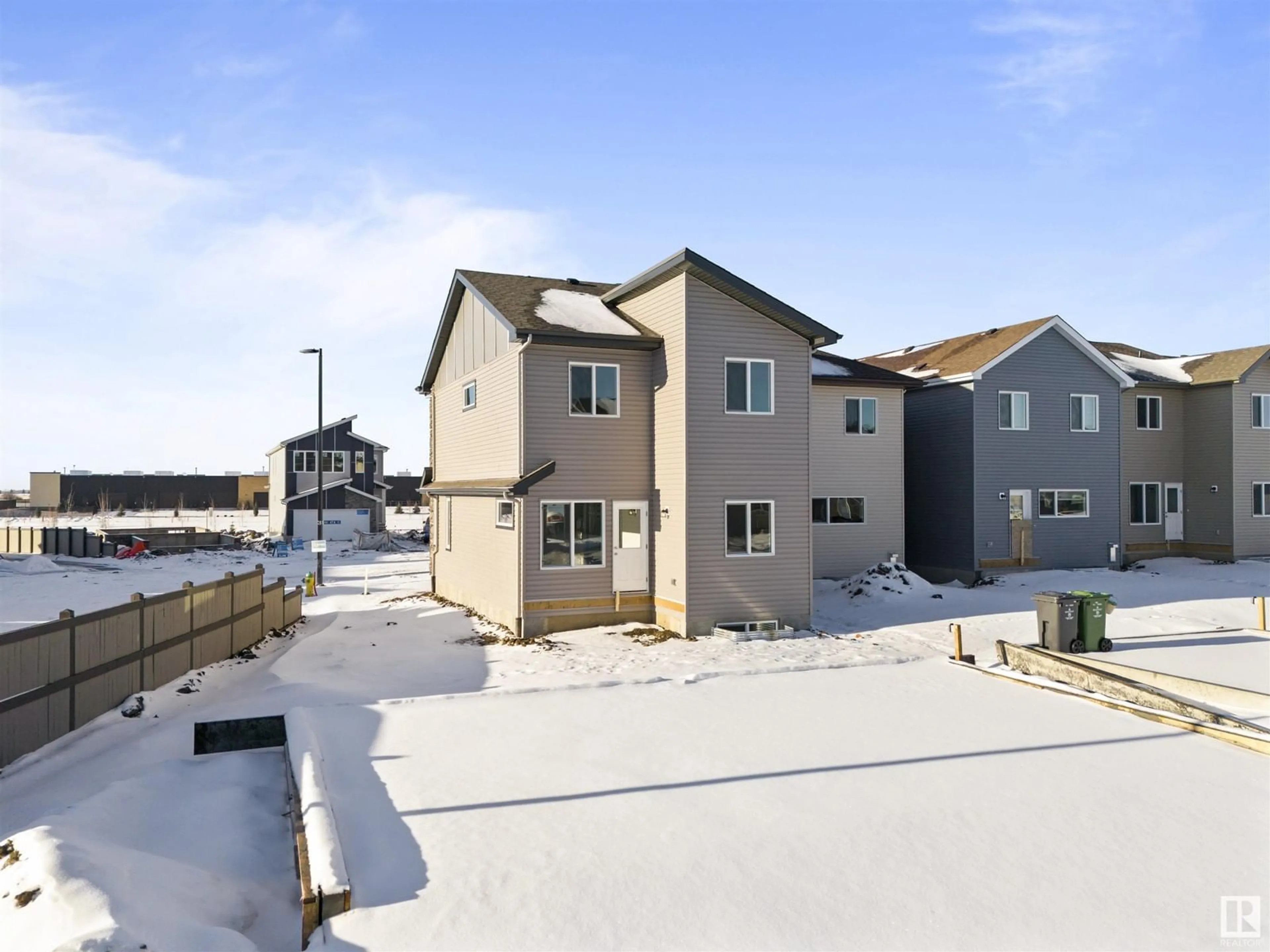 Frontside or backside of a home, the fenced backyard for #7101 7101 47A ST, Beaumont Alberta T4X3B7